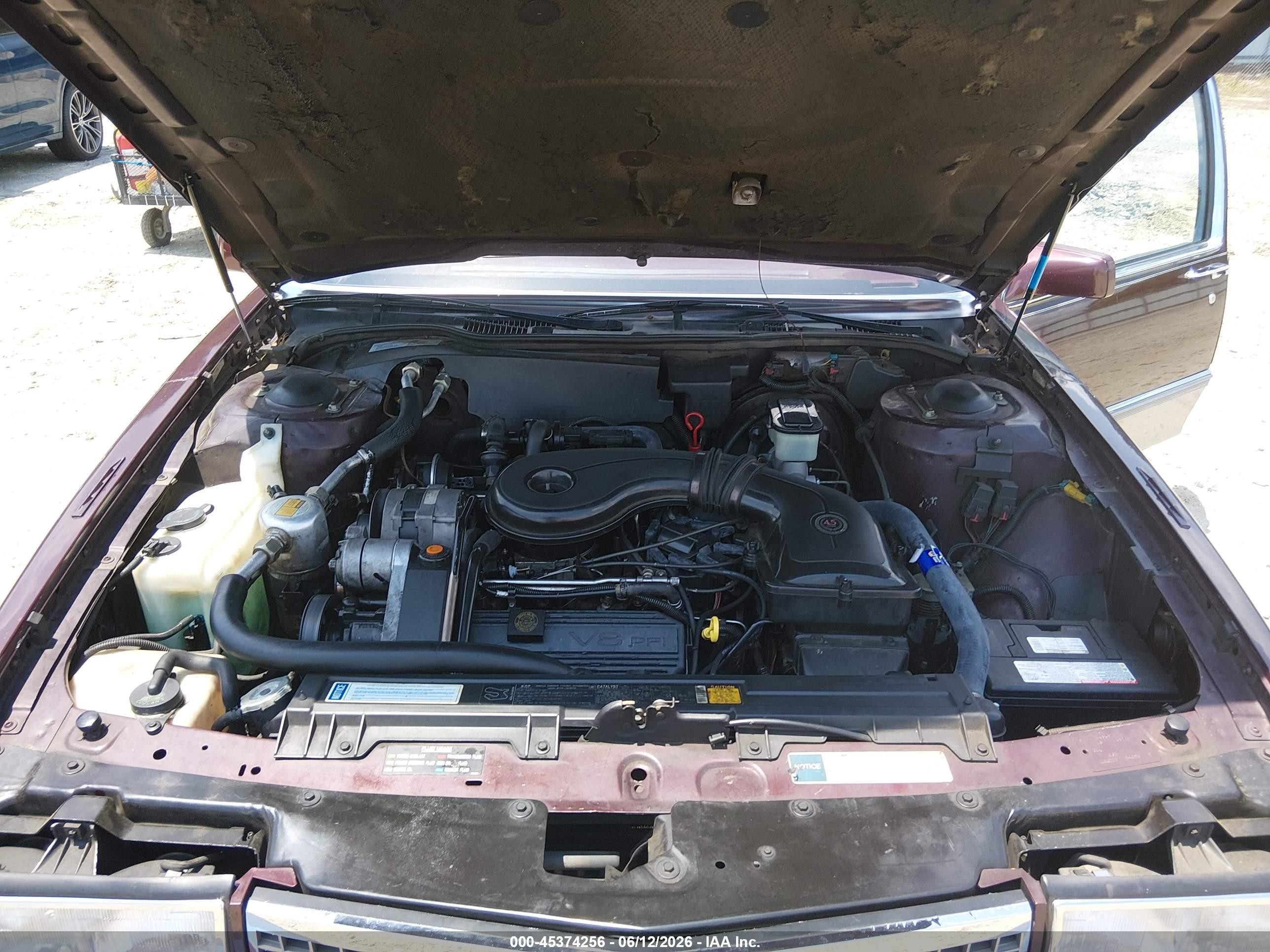 1990 Cadillac Deville   Бордовый vin: 1G6CD5330L4312775