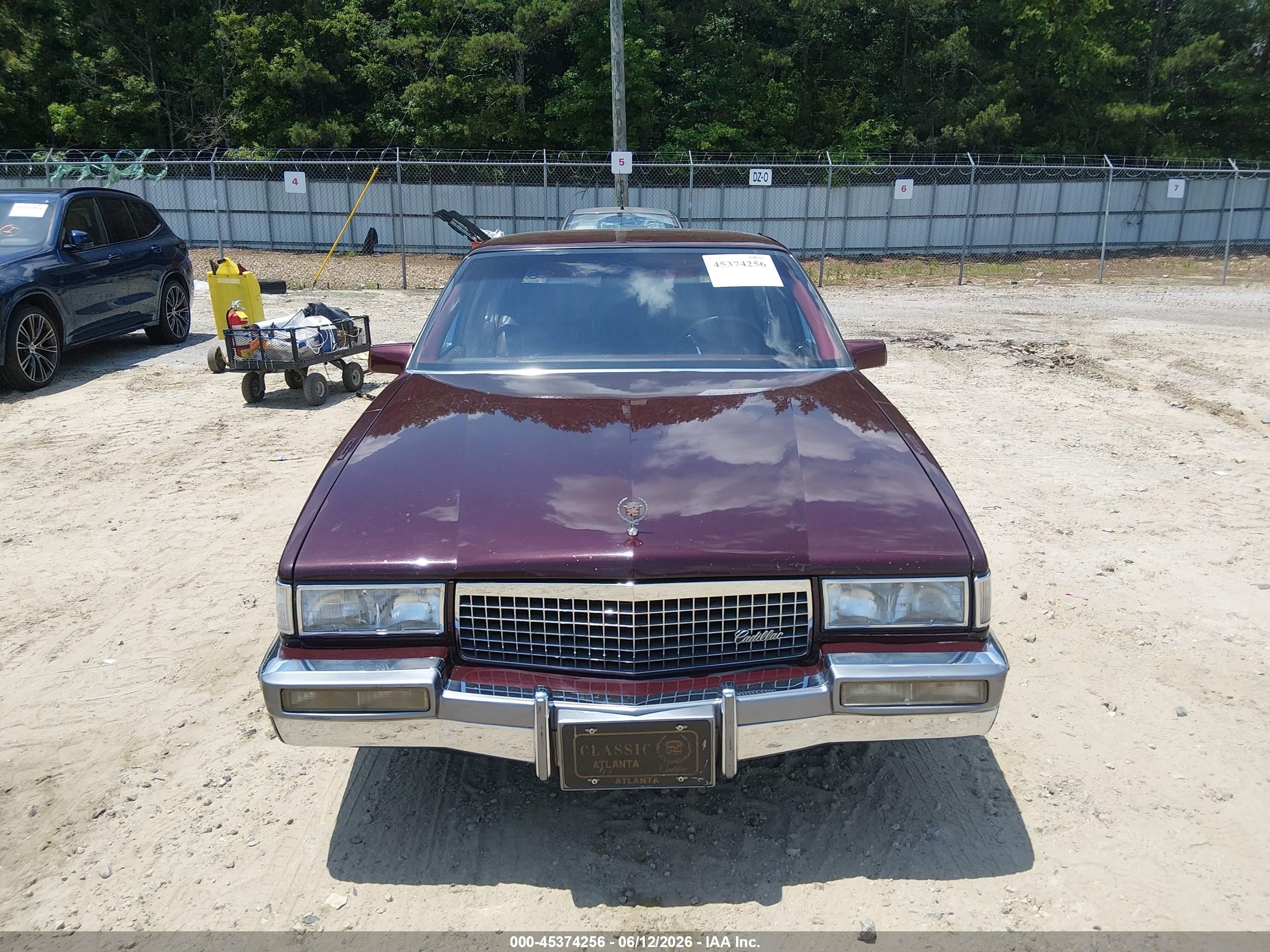 1990 Cadillac Deville   Бордовый vin: 1G6CD5330L4312775