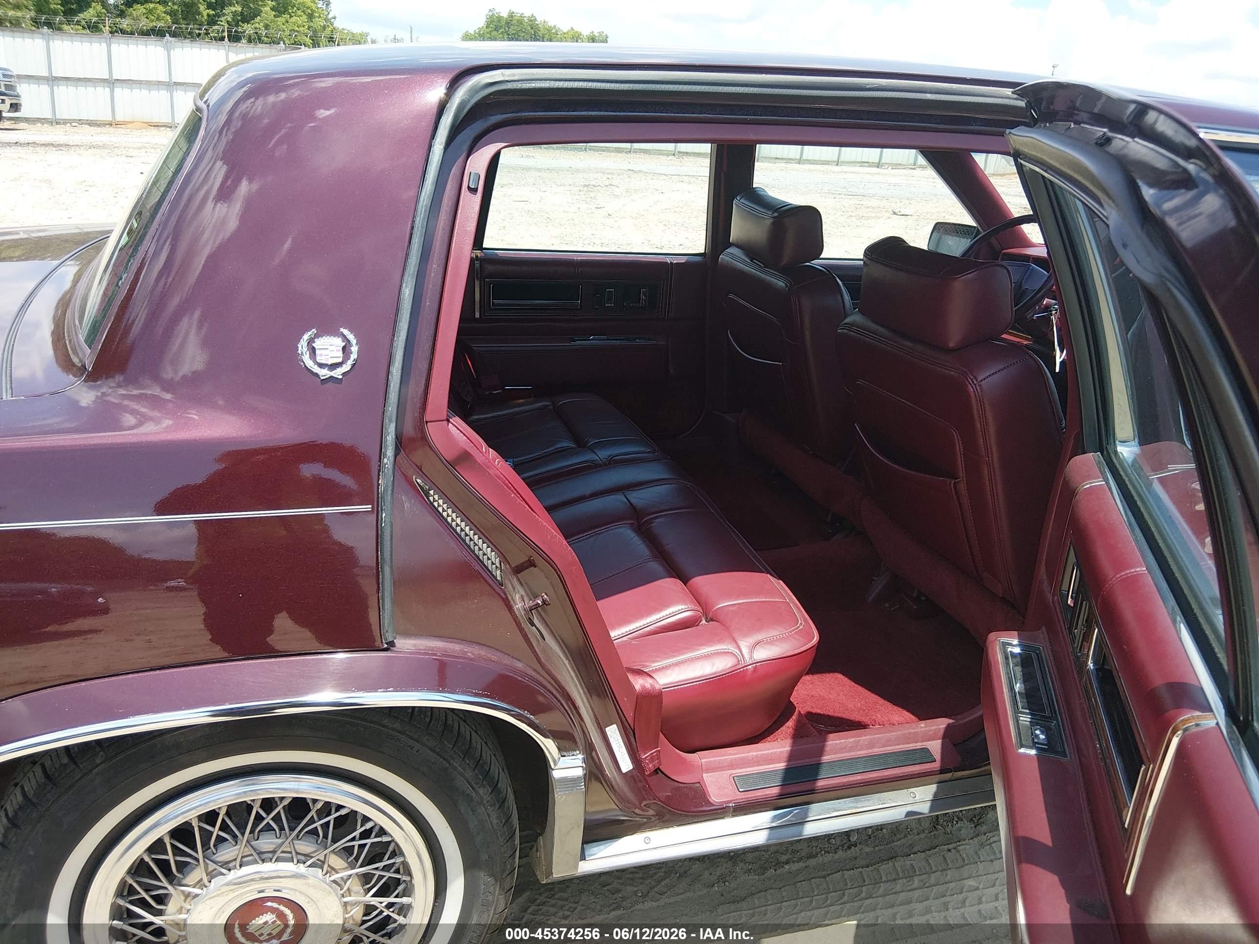 1990 Cadillac Deville   Бордовый vin: 1G6CD5330L4312775