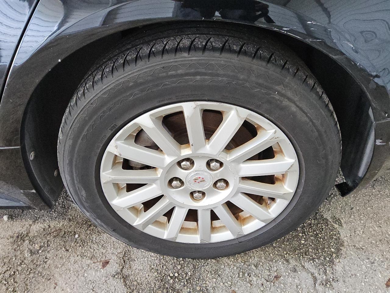 2010 Cadillac Cts Black vin: 1G6DA5EG0A0111928 Damage: Left Rear Wheel, Curb Rash, 5 To 6 Inches