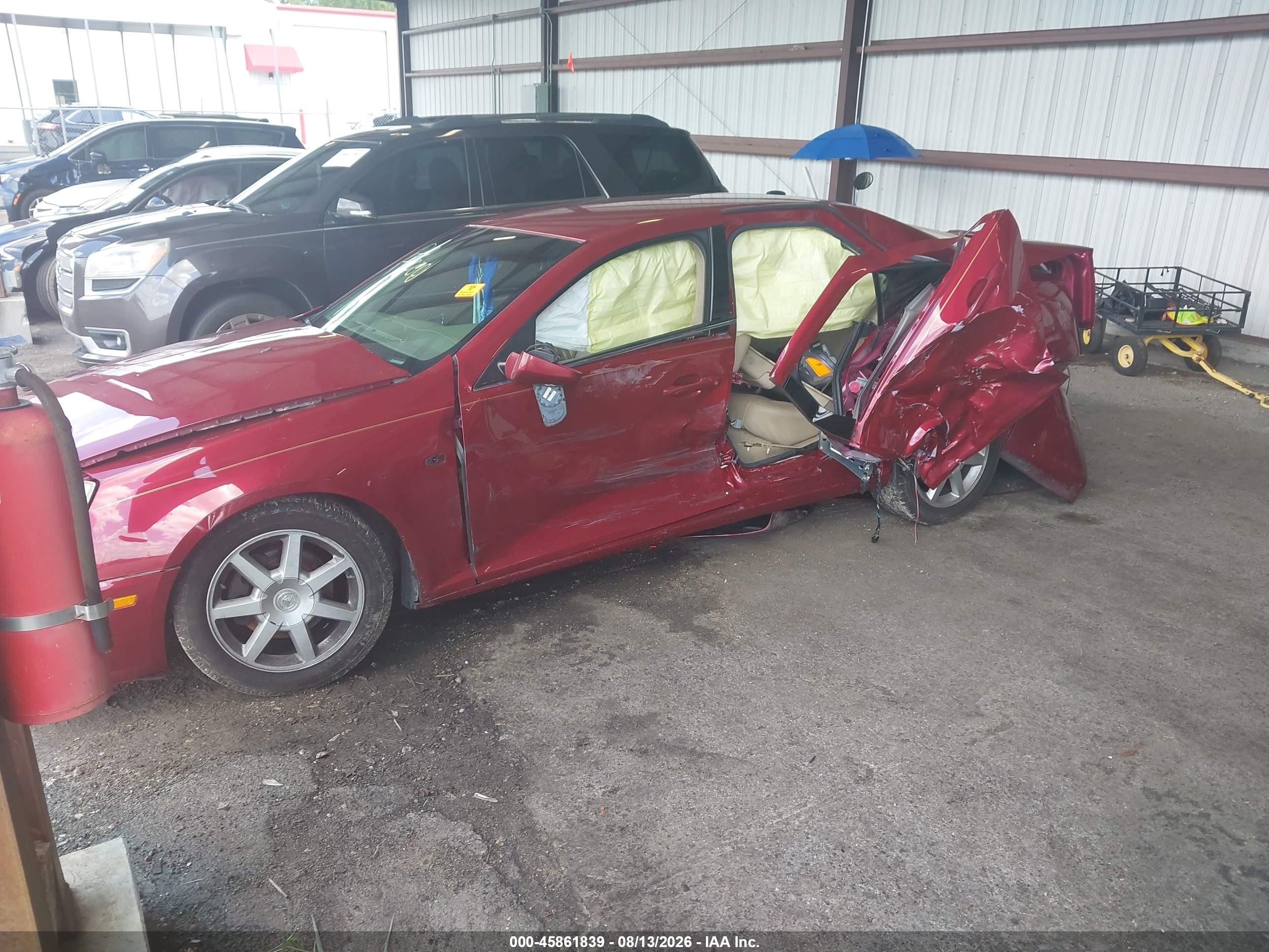 2005 Cadillac Sts V8 Burgundy vin: 1G6DC67A650139635