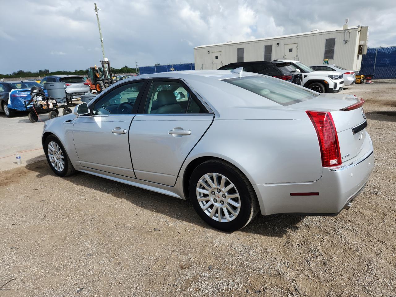 2011 Cadillac Cts Luxury Collection Silver vin: 1G6DE5EY1B0164474 Damage: Left Drip Rail, Dent(S) W/ Paint Dmg, 4 To 5 Inches