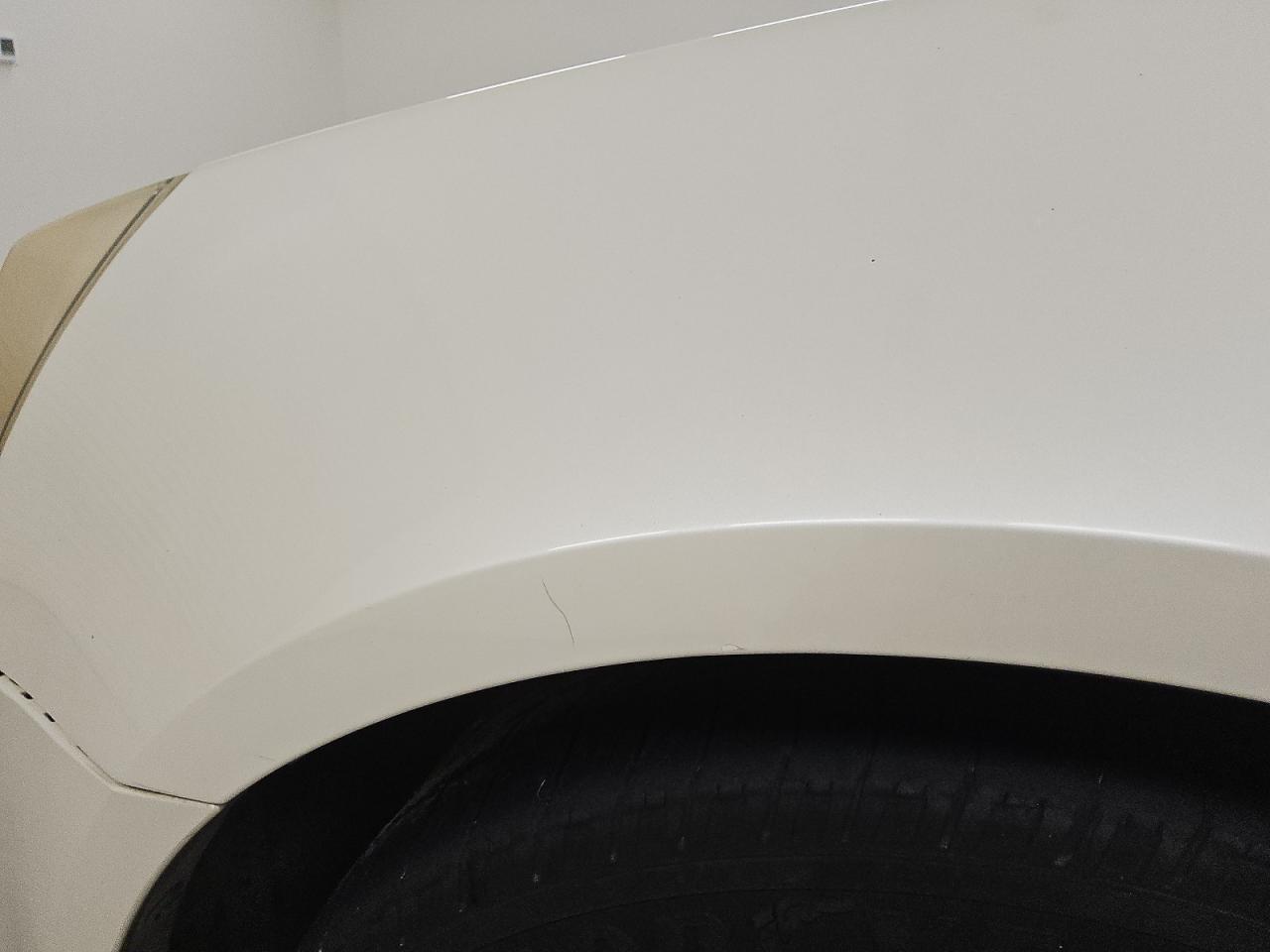2008 Cadillac Cts White vin: 1G6DF577380194991 Damage: Left Front Fender, Heavy Scratch, 1/2 To 1 Inch