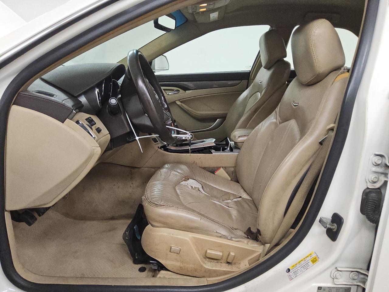 2008 Cadillac Cts White vin: 1G6DF577380194991 Damage: Left Front Seat Cushion, Torn, > 12 Inches