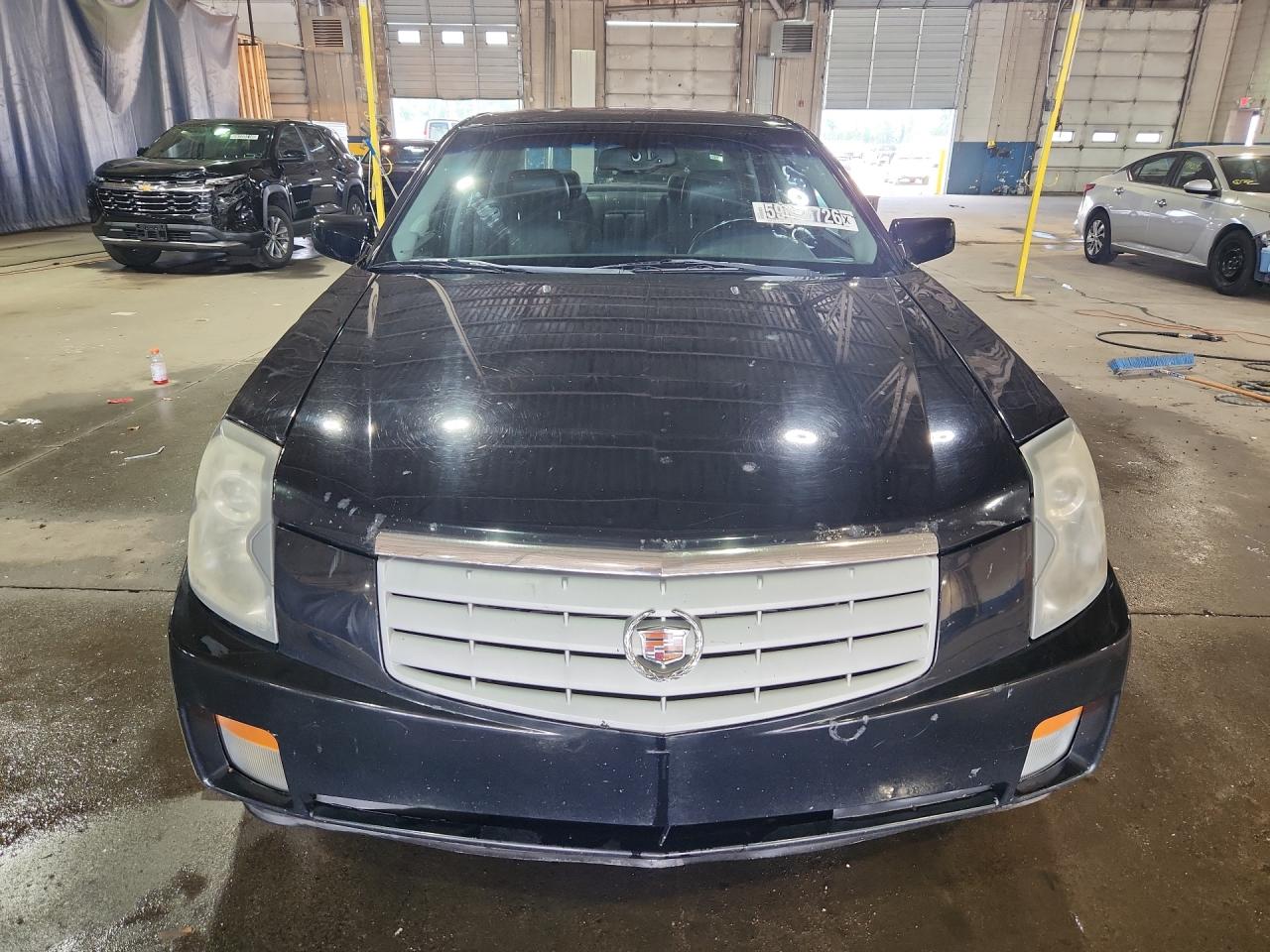 2007 Cadillac Cts Black vin: 1G6DM57T670138786 Damage: Left Head Lamp, Faded, Repair Required