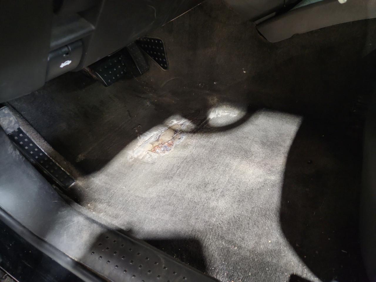2007 Cadillac Cts Black vin: 1G6DM57T670138786 Damage: Left Front Carpet, Torn, > 12 Inches