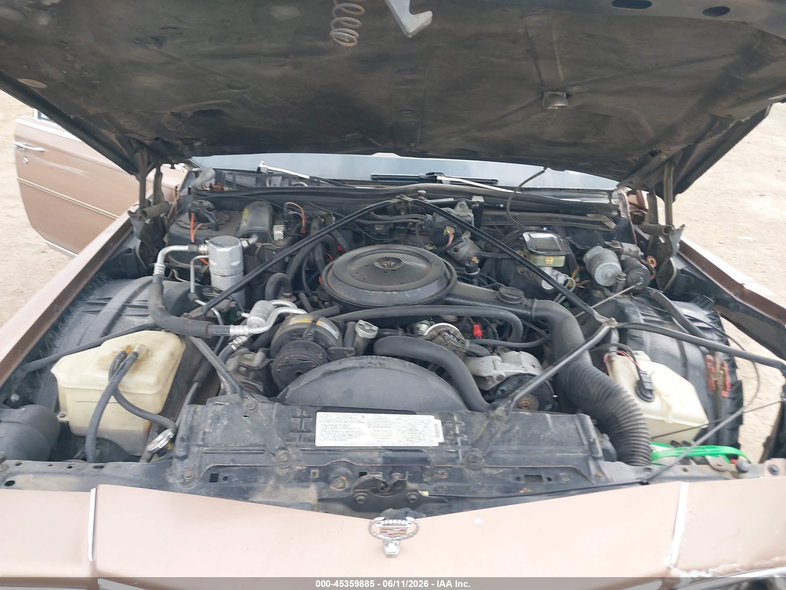 1988 Cadillac Brougham   Brown vin: 1G6DW51Y2J9702872