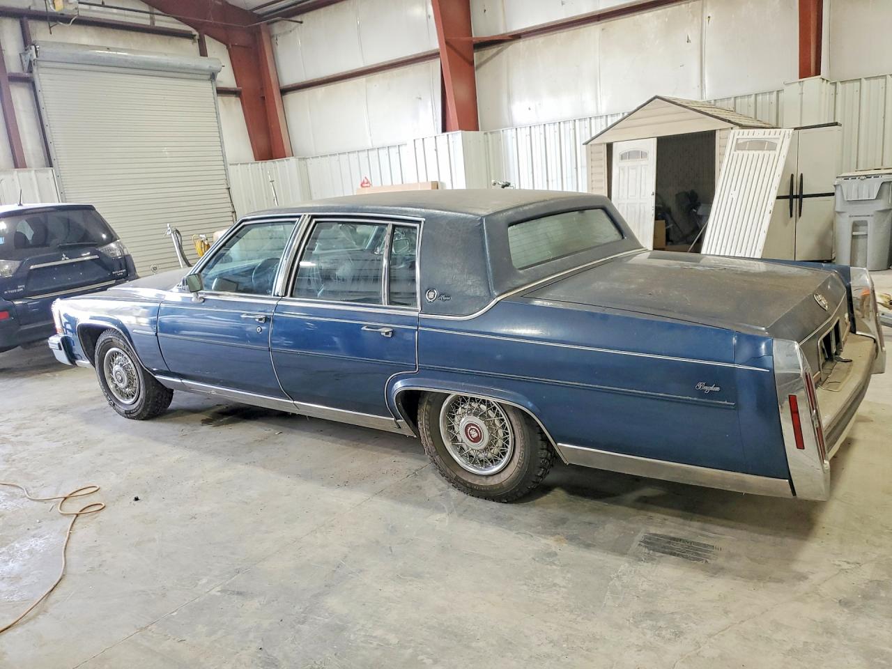 1988 Cadillac Brougham Blue vin: 1G6DW51Y4J9730057