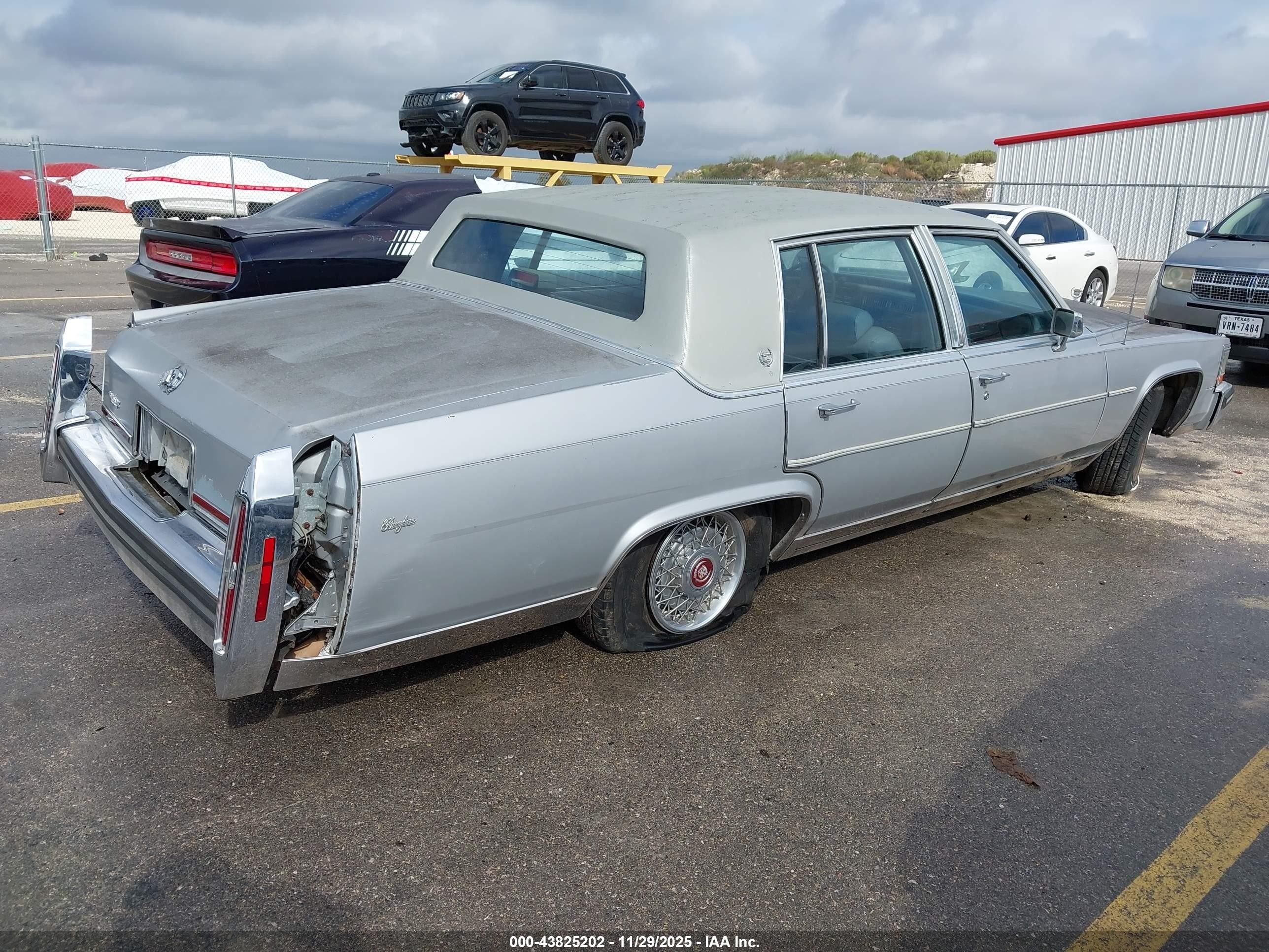 1988 Cadillac Brougham   Silver vin: 1G6DW51Y7J9733938