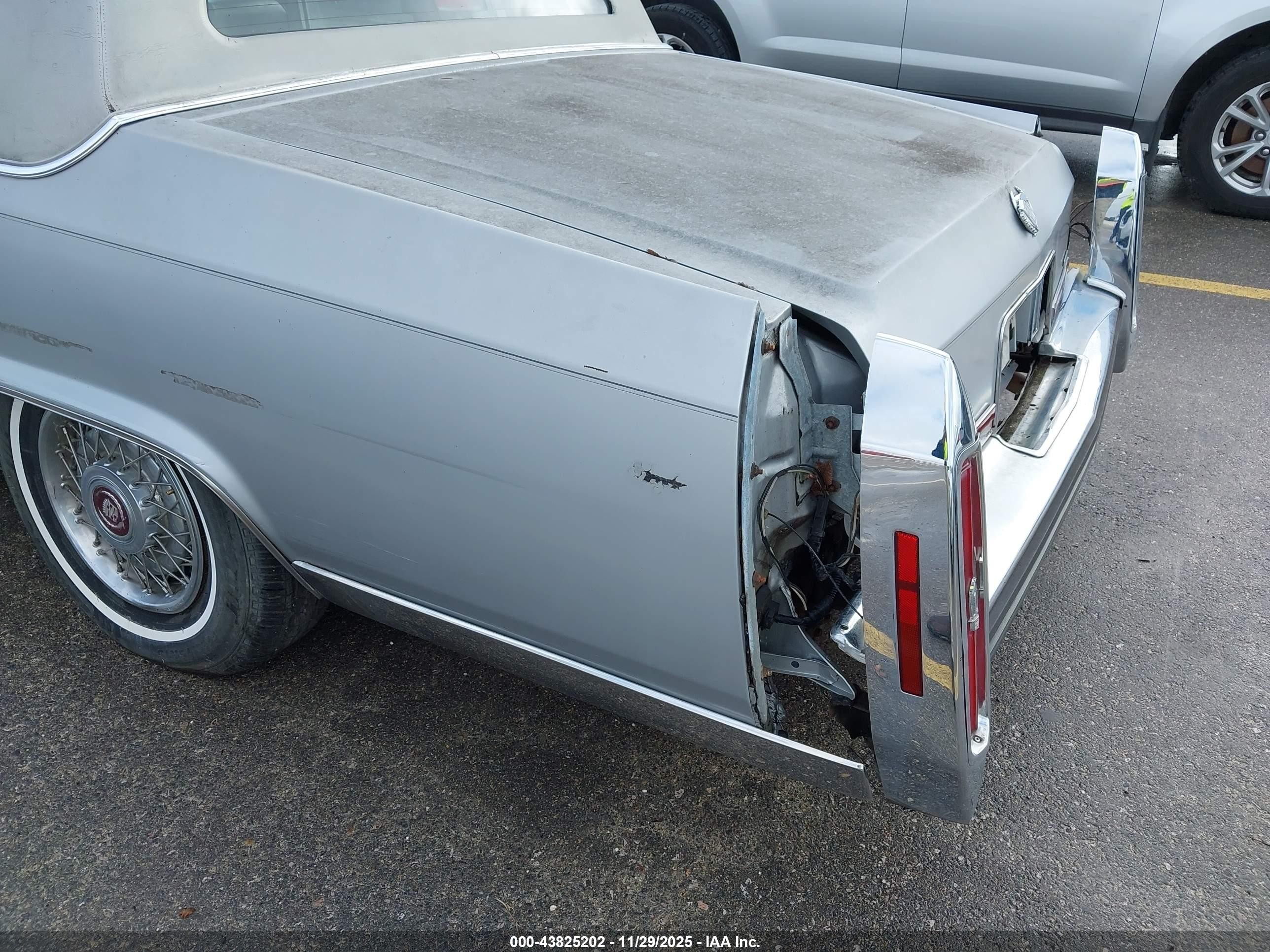 1988 Cadillac Brougham   Silver vin: 1G6DW51Y7J9733938