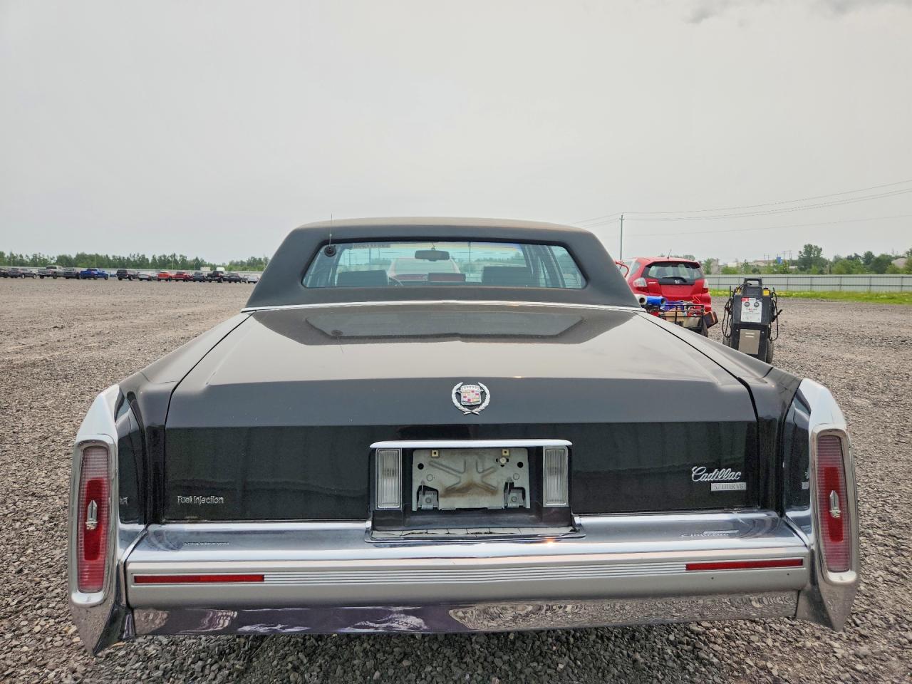 1990 Cadillac Brougham Black vin: 1G6DW5472LR727082