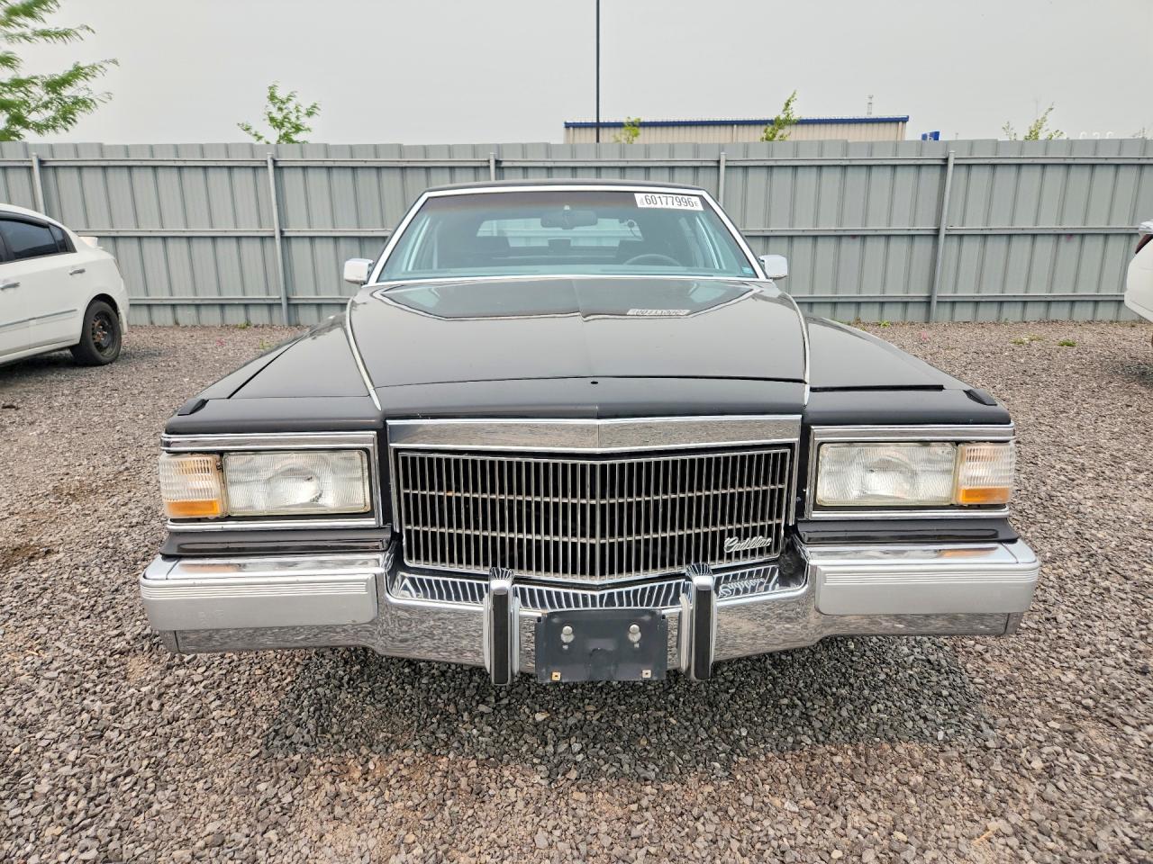 1990 Cadillac Brougham Black vin: 1G6DW5472LR727082