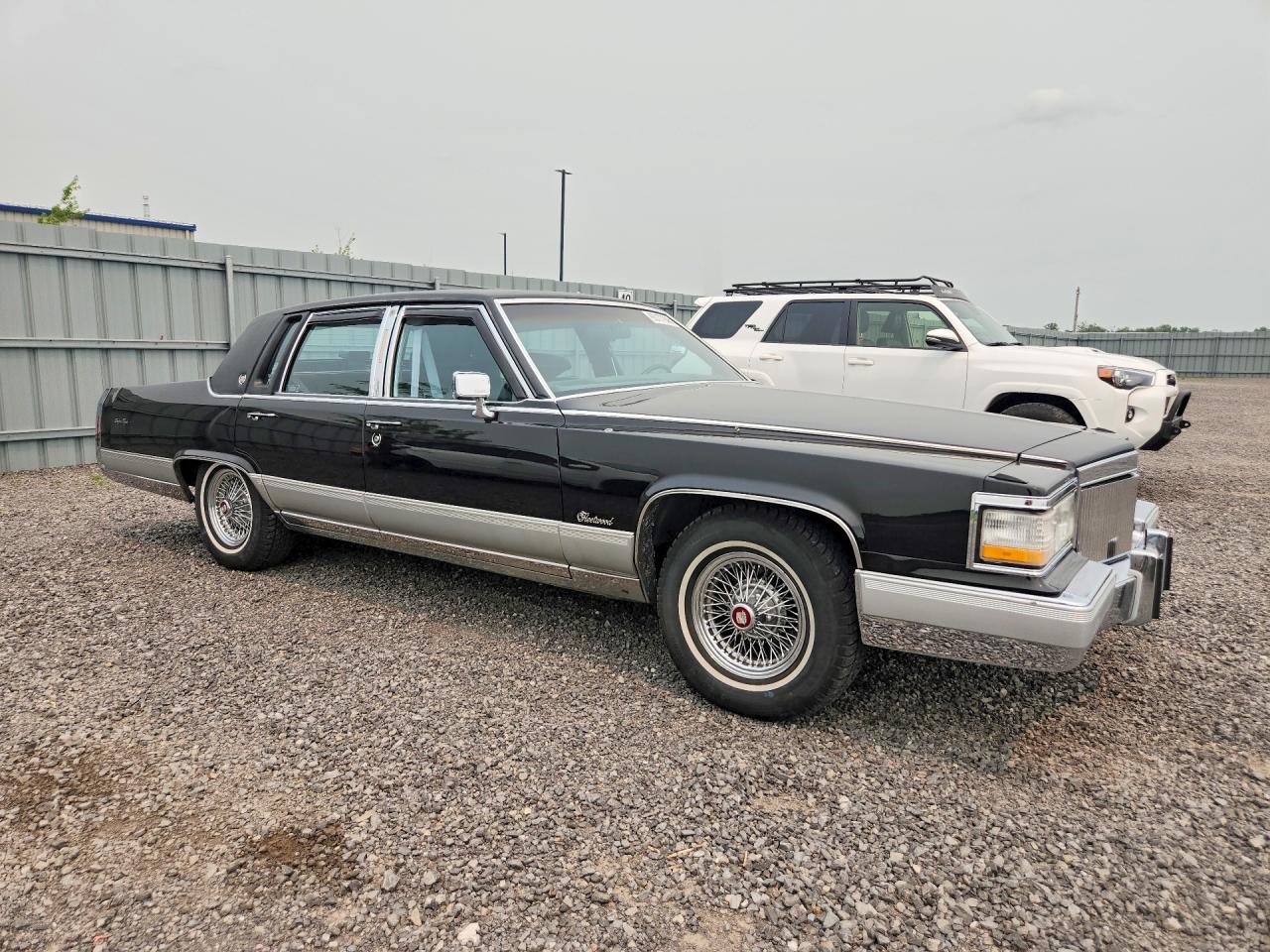 1990 Cadillac Brougham Black vin: 1G6DW5472LR727082