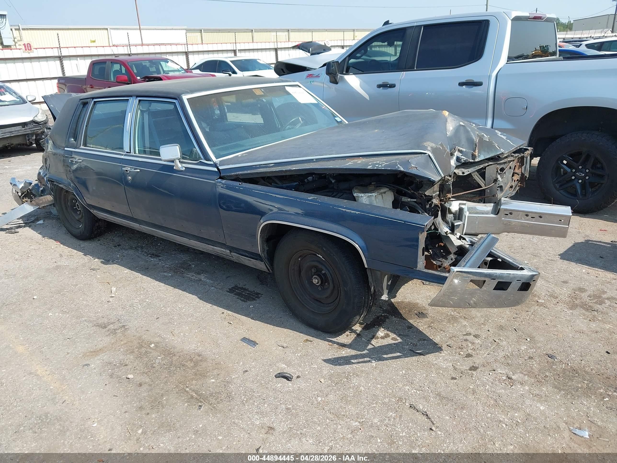 1990 Cadillac Brougham   Blue vin: 1G6DW5477LR712819