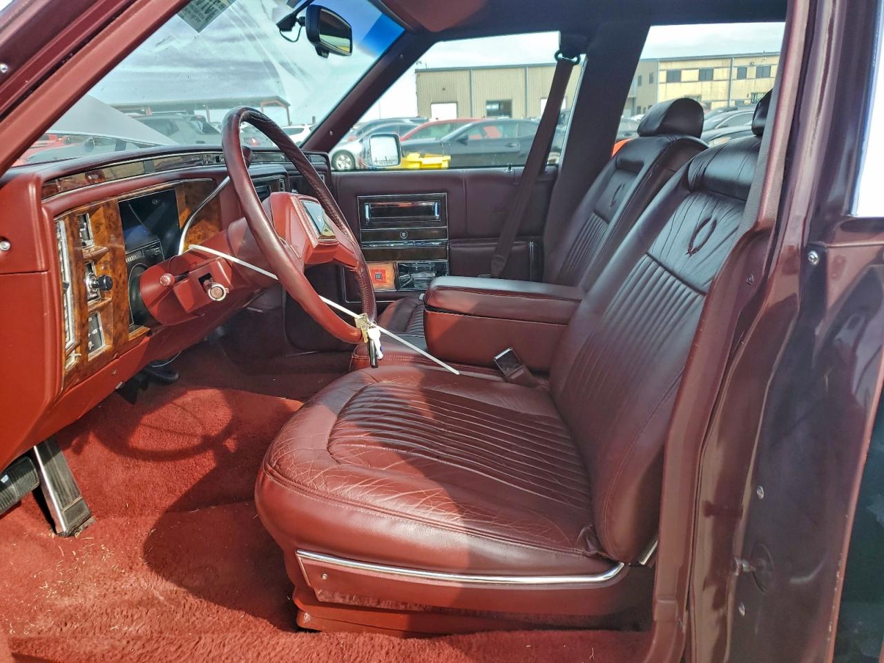 1991 Cadillac Brougham Burgundy vin: 1G6DW5477MR726947