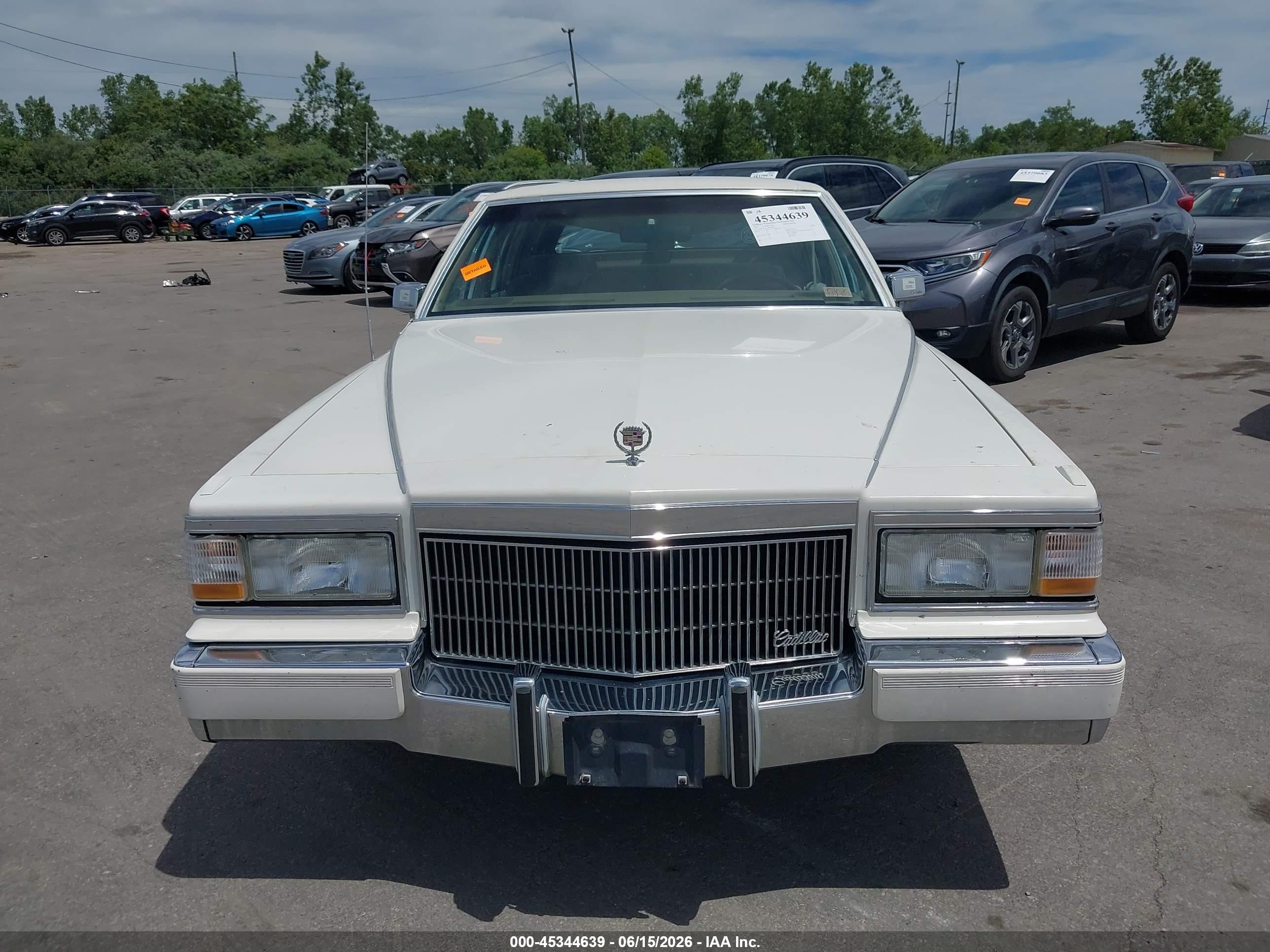 1991 Cadillac Brougham   White vin: 1G6DW54E5MR702290