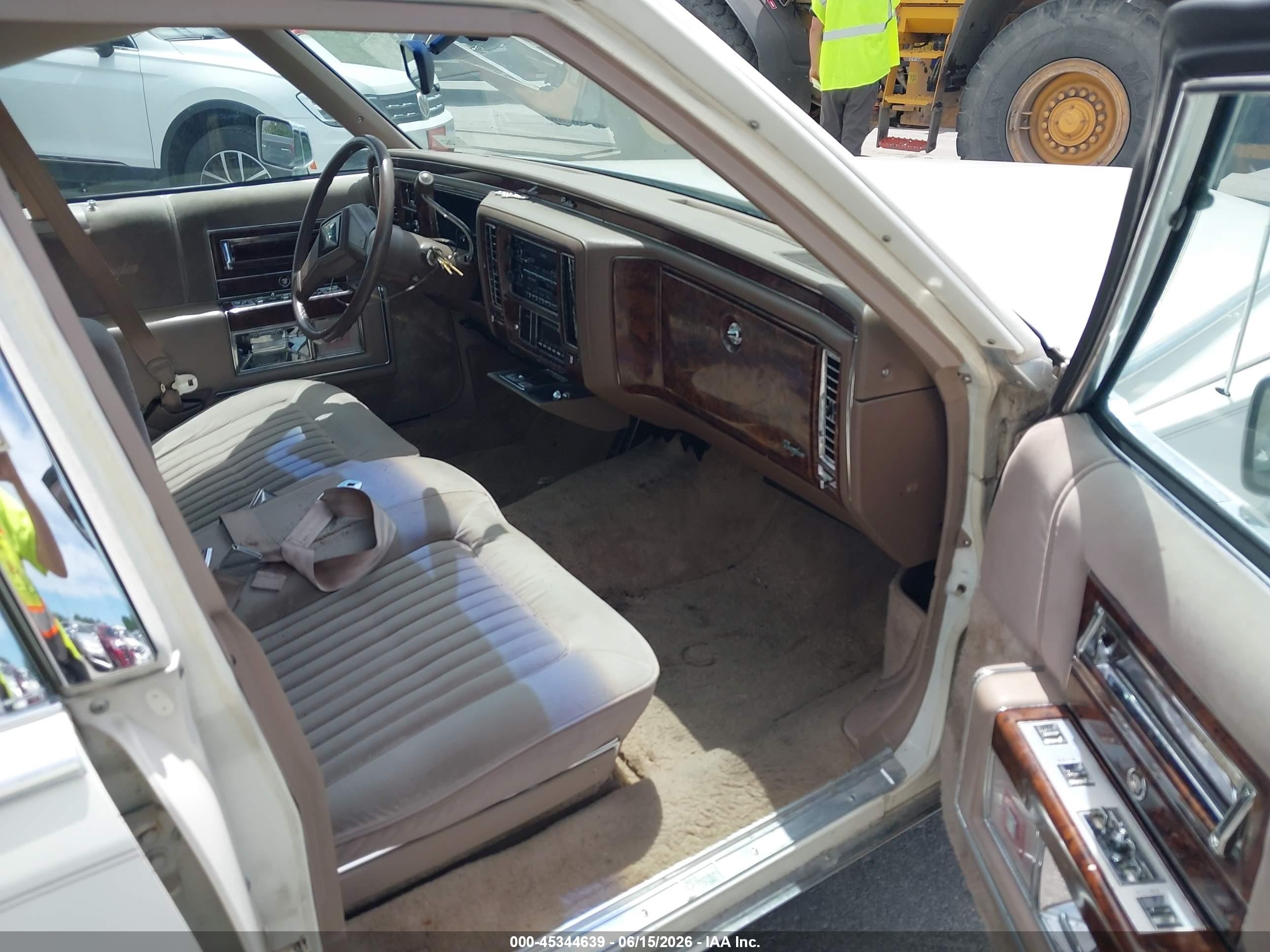 1991 Cadillac Brougham   White vin: 1G6DW54E5MR702290