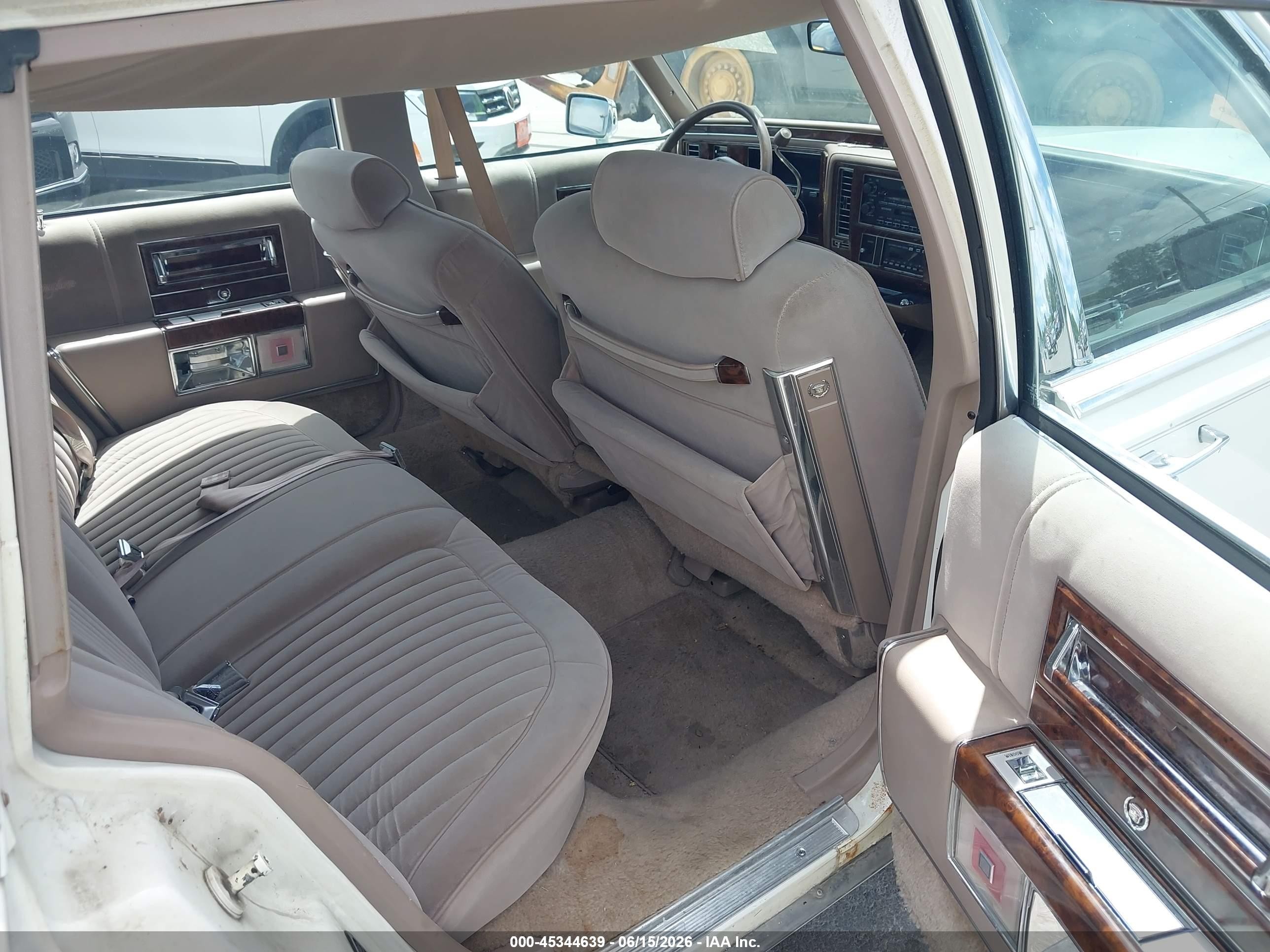 1991 Cadillac Brougham   White vin: 1G6DW54E5MR702290