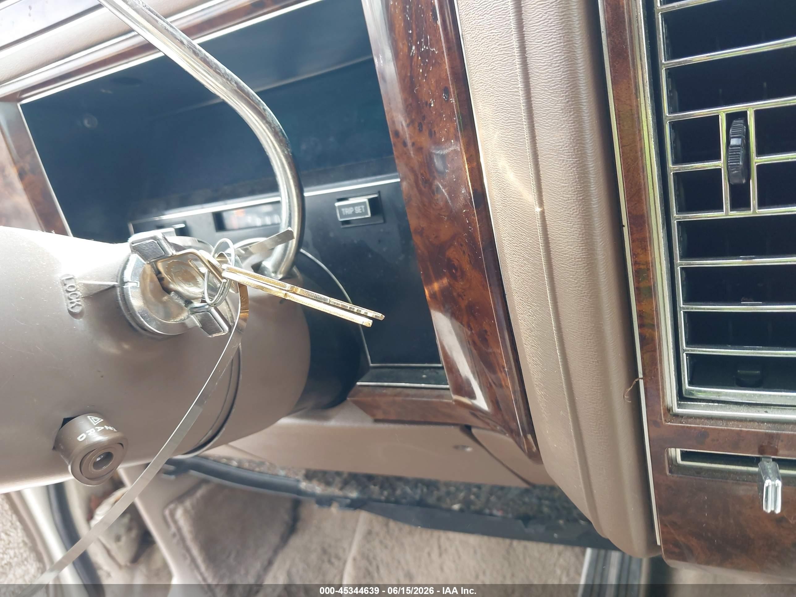 1991 Cadillac Brougham   White vin: 1G6DW54E5MR702290