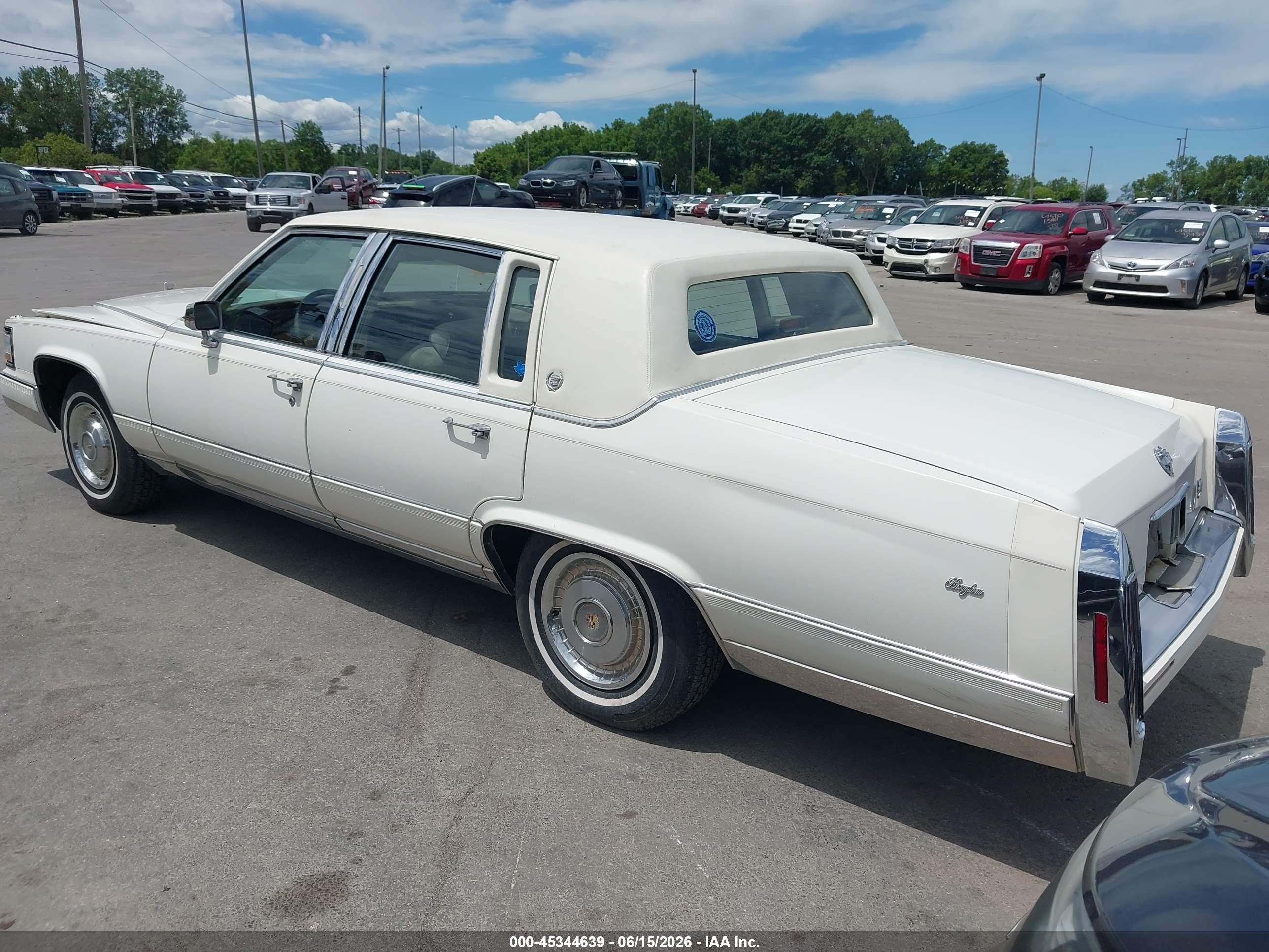 1991 Cadillac Brougham   White vin: 1G6DW54E5MR702290