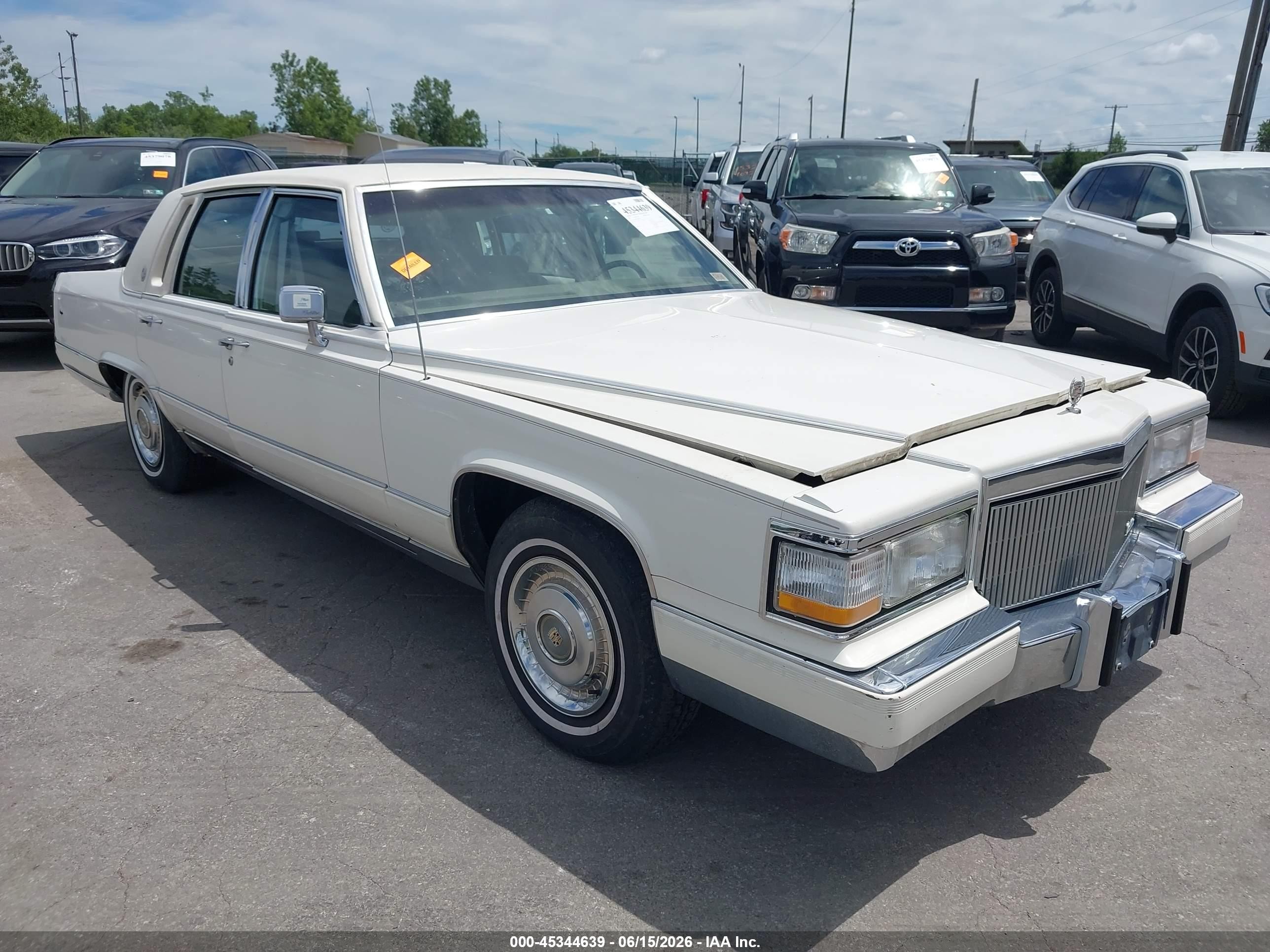 1991 Cadillac Brougham   White vin: 1G6DW54E5MR702290