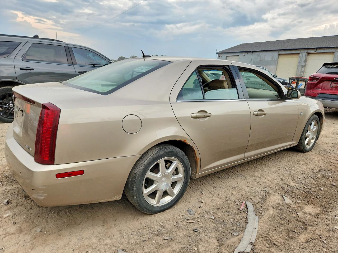 2005 Cadillac Sts Tan vin: 1G6DW677250180579