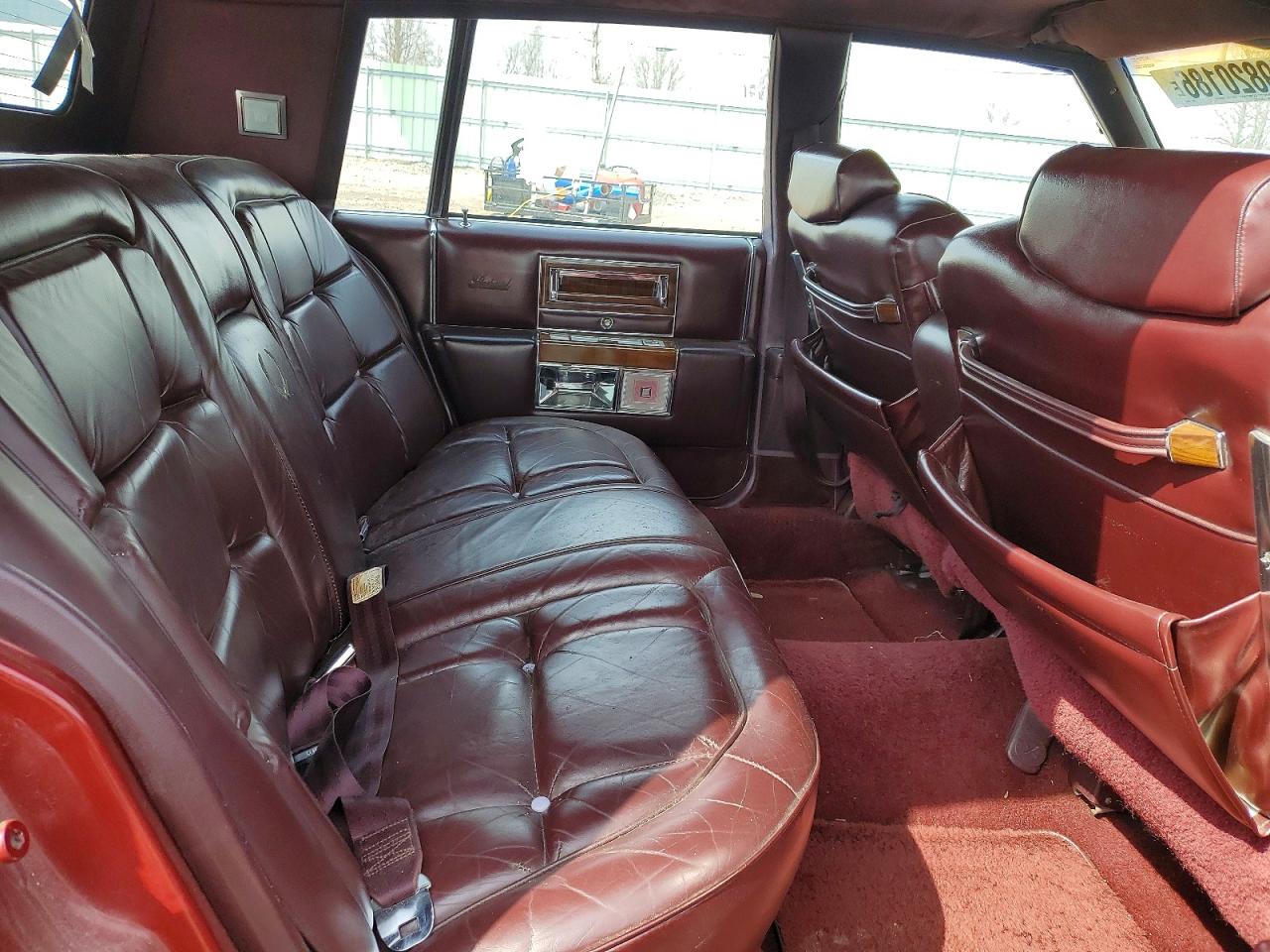 1986 Cadillac Fleetwood Brougham Maroon vin: 1G6DW69YXG9739087