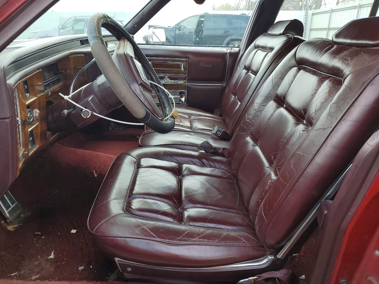 1986 Cadillac Fleetwood Brougham Maroon vin: 1G6DW69YXG9739087