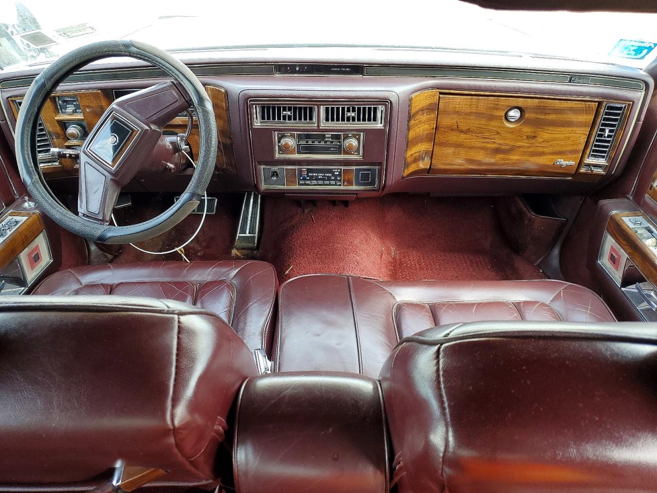 1986 Cadillac Fleetwood Brougham Maroon vin: 1G6DW69YXG9739087