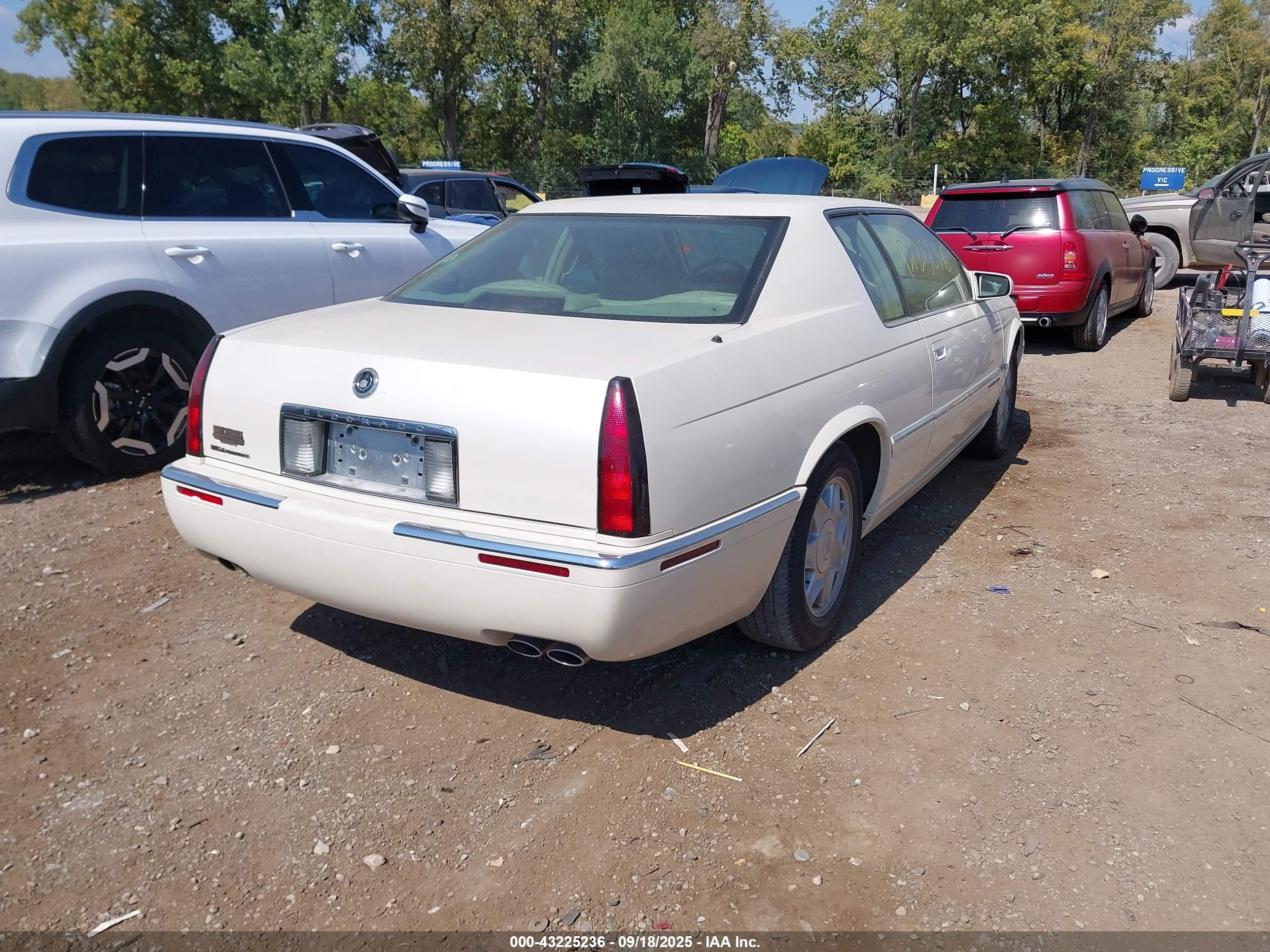 1999 Cadillac Eldorado Standard Cream vin: 1G6EL12Y9XU602259