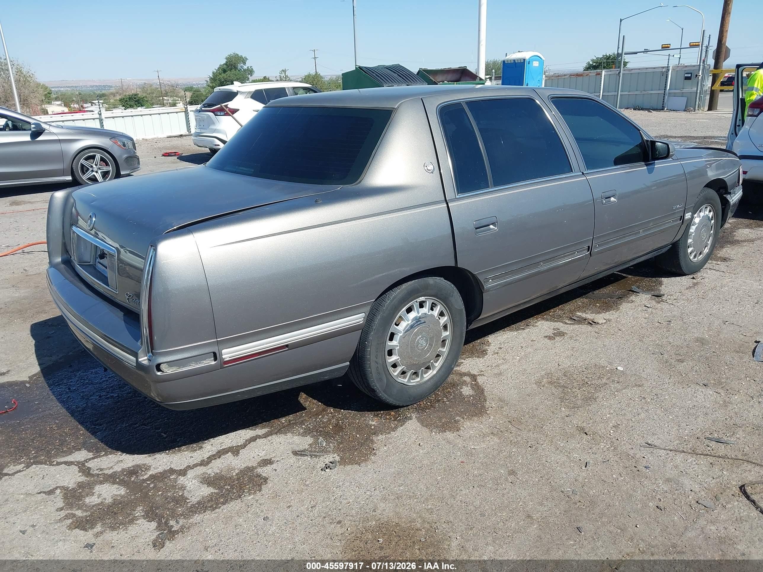 1999 Cadillac Deville Standard Dark Brown vin: 1G6KD54Y1XU740978