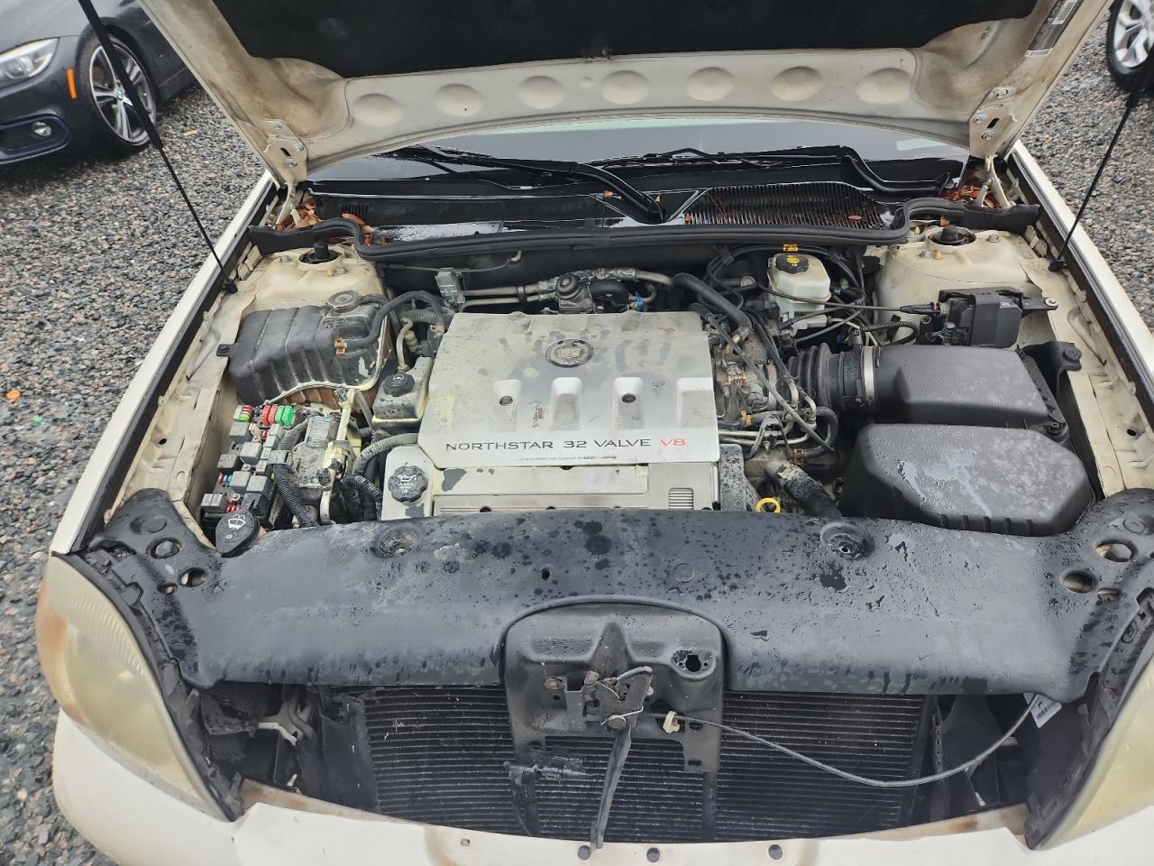 2003 Cadillac Deville Cream vin: 1G6KD54Y23U278876