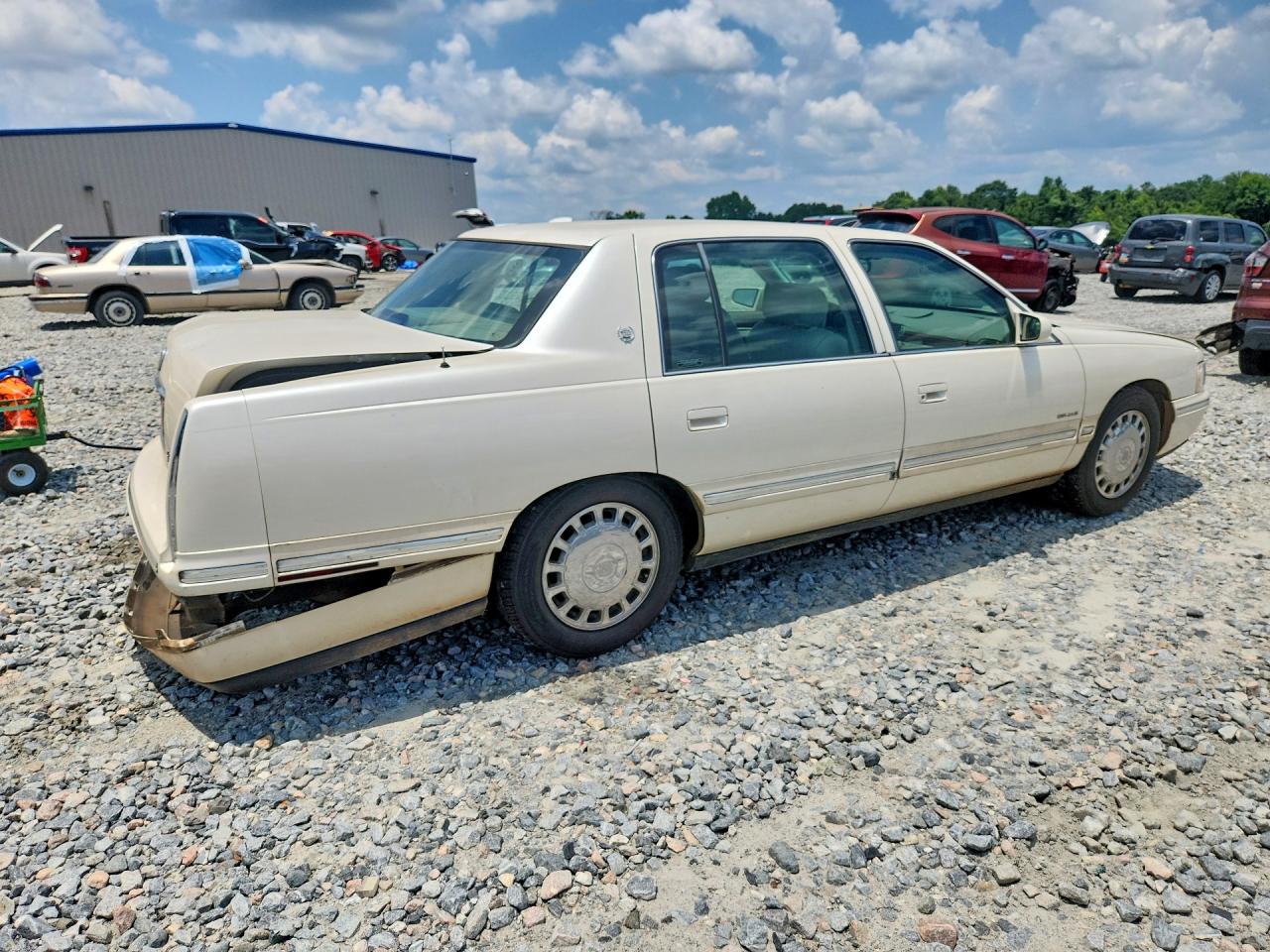 1999 Cadillac Deville Cream vin: 1G6KD54Y3XU800260
