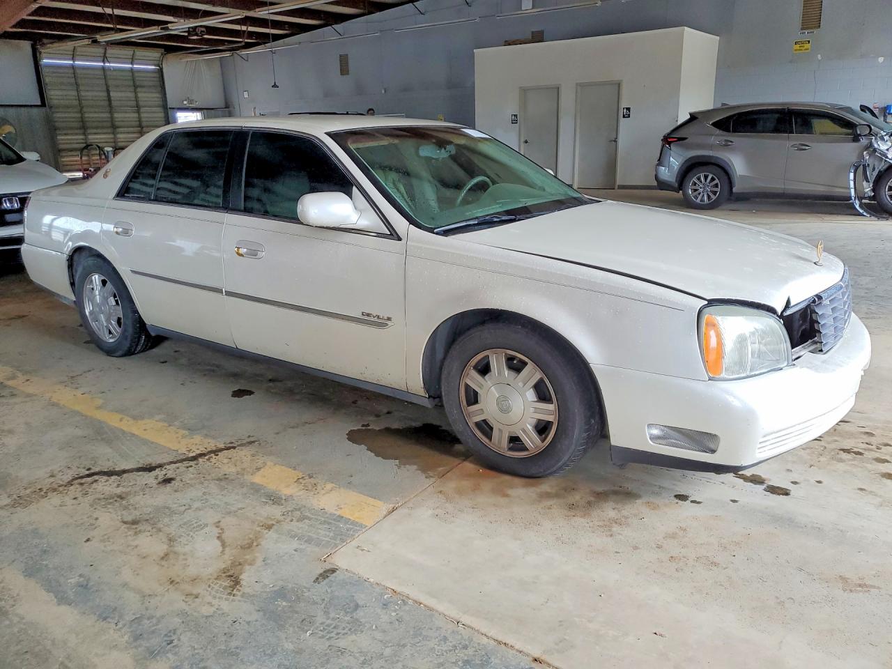 2003 Cadillac Deville Base Cream vin: 1G6KD54Y43U223135