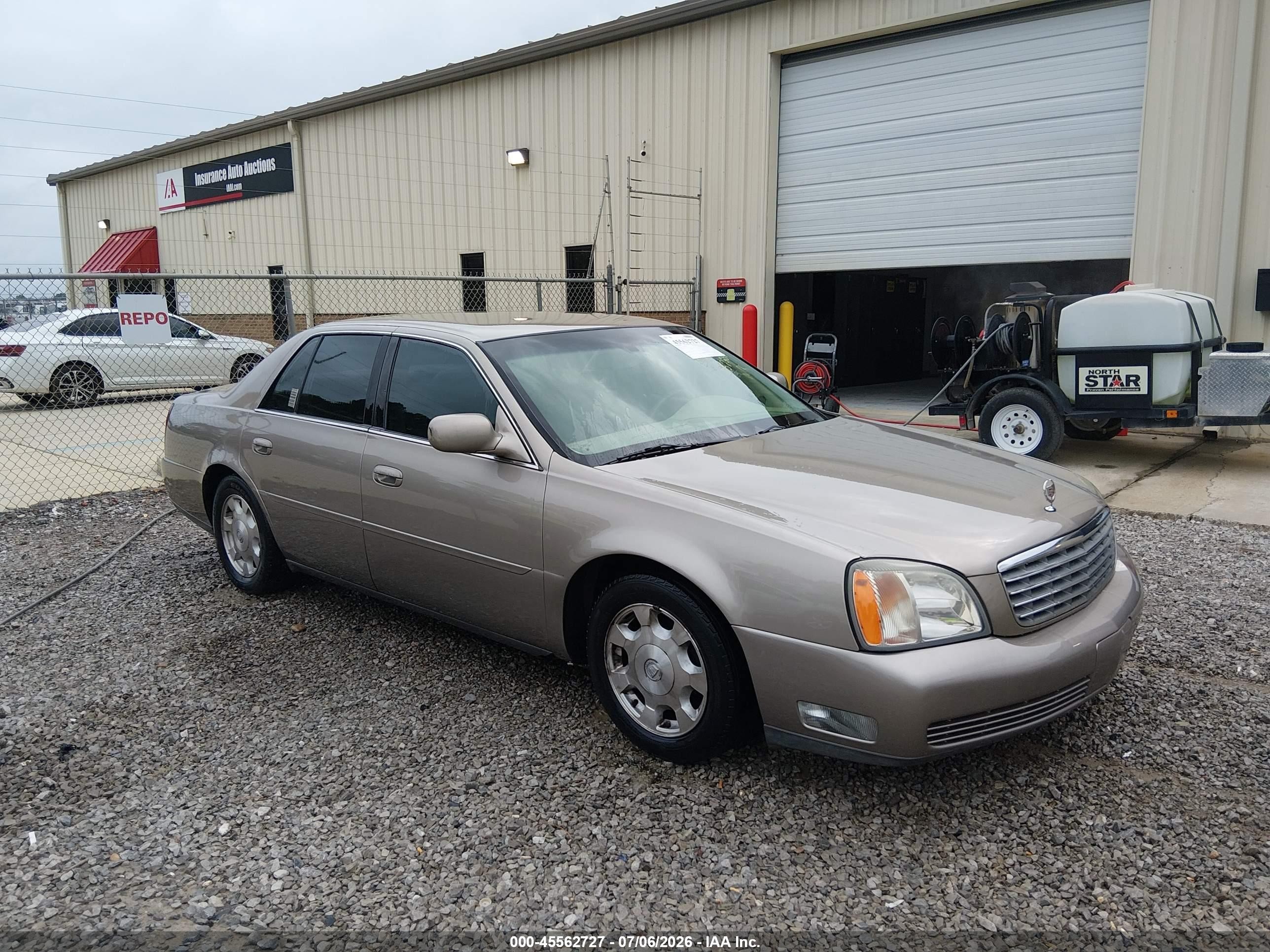 2002 Cadillac Deville   Золотой vin: 1G6KD54Y52U152252