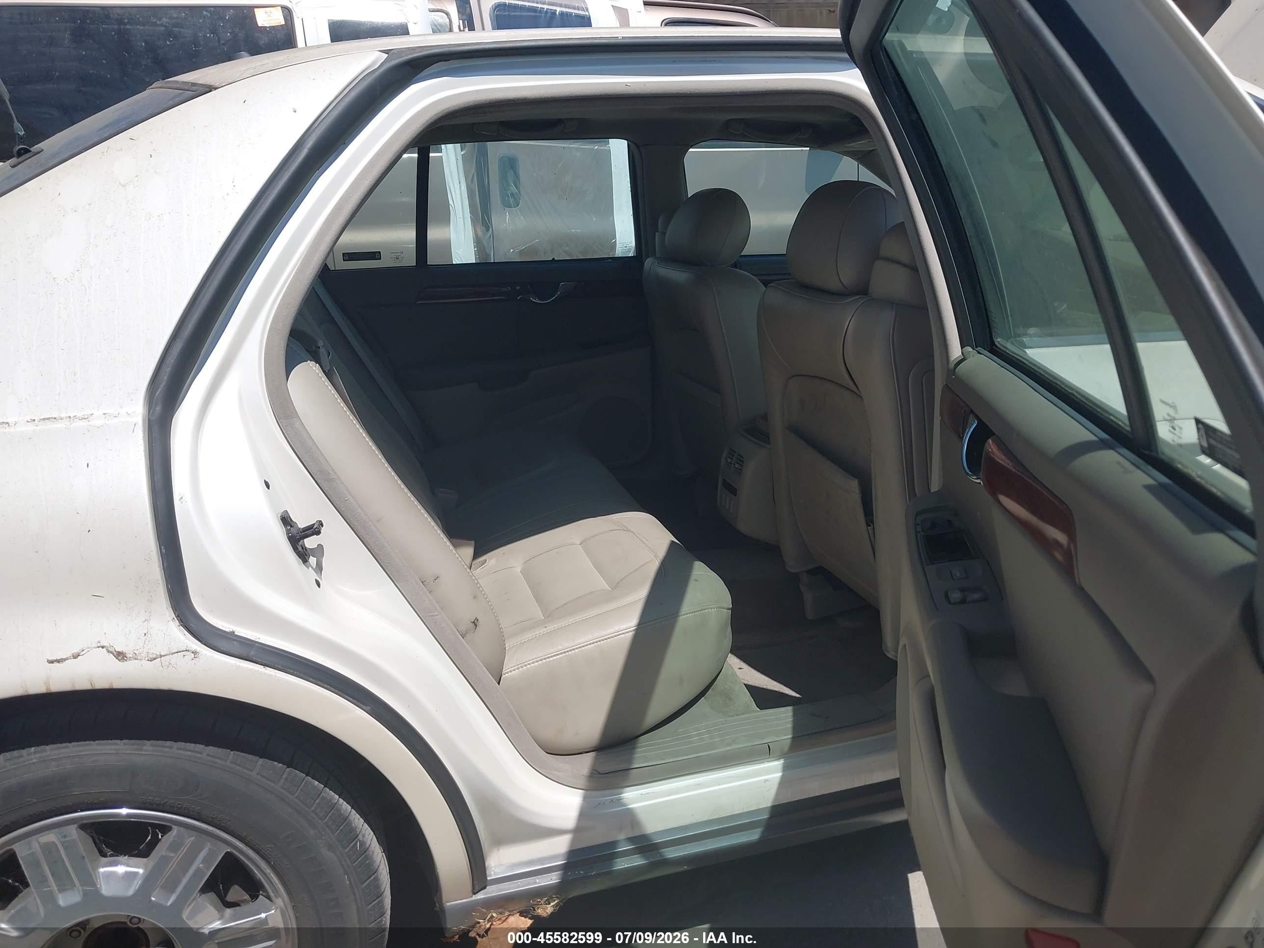 2003 Cadillac Deville Standard Cream vin: 1G6KD54Y53U129247