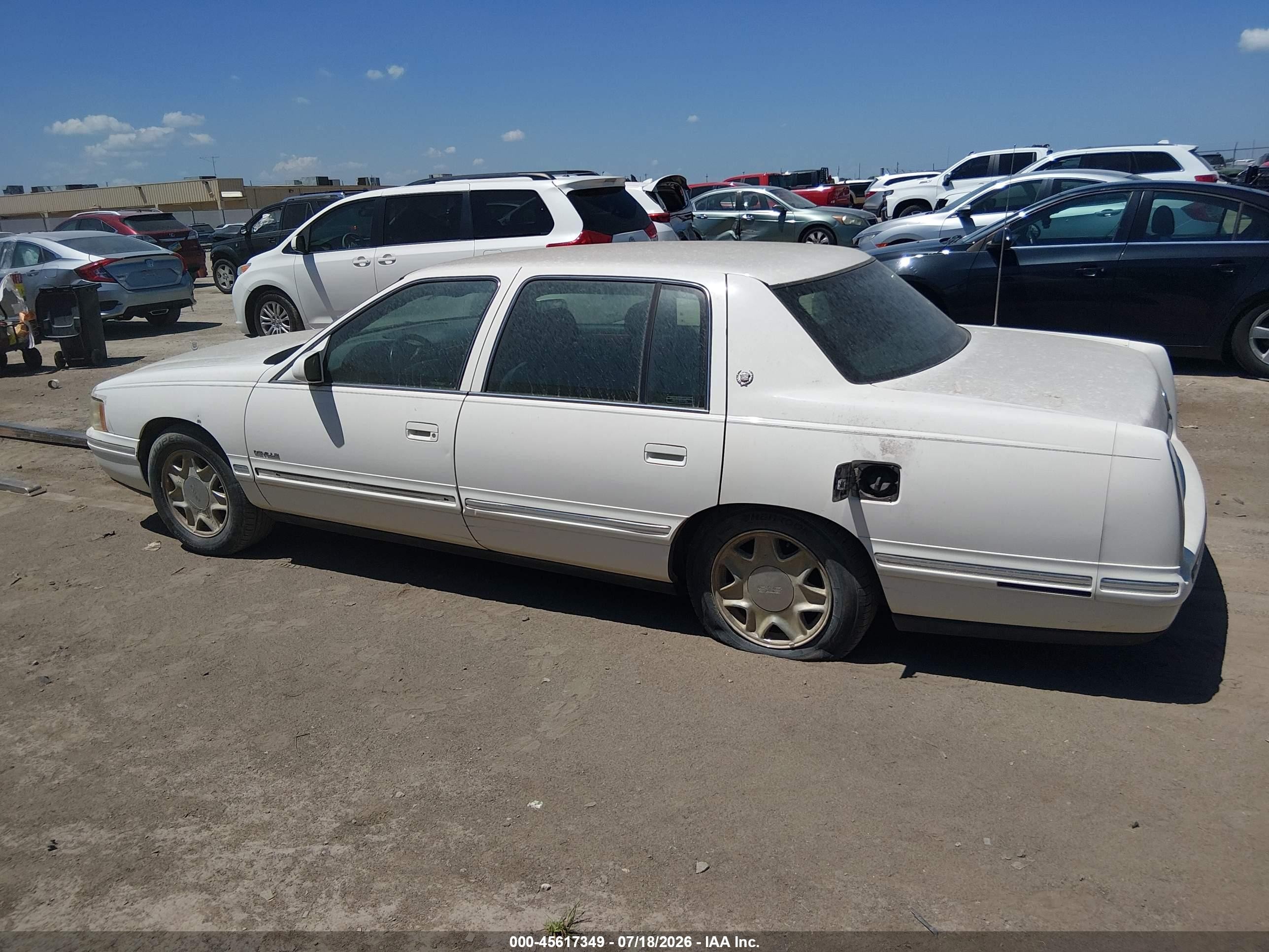 1999 Cadillac Deville   Белый vin: 1G6KD54Y9XU720994