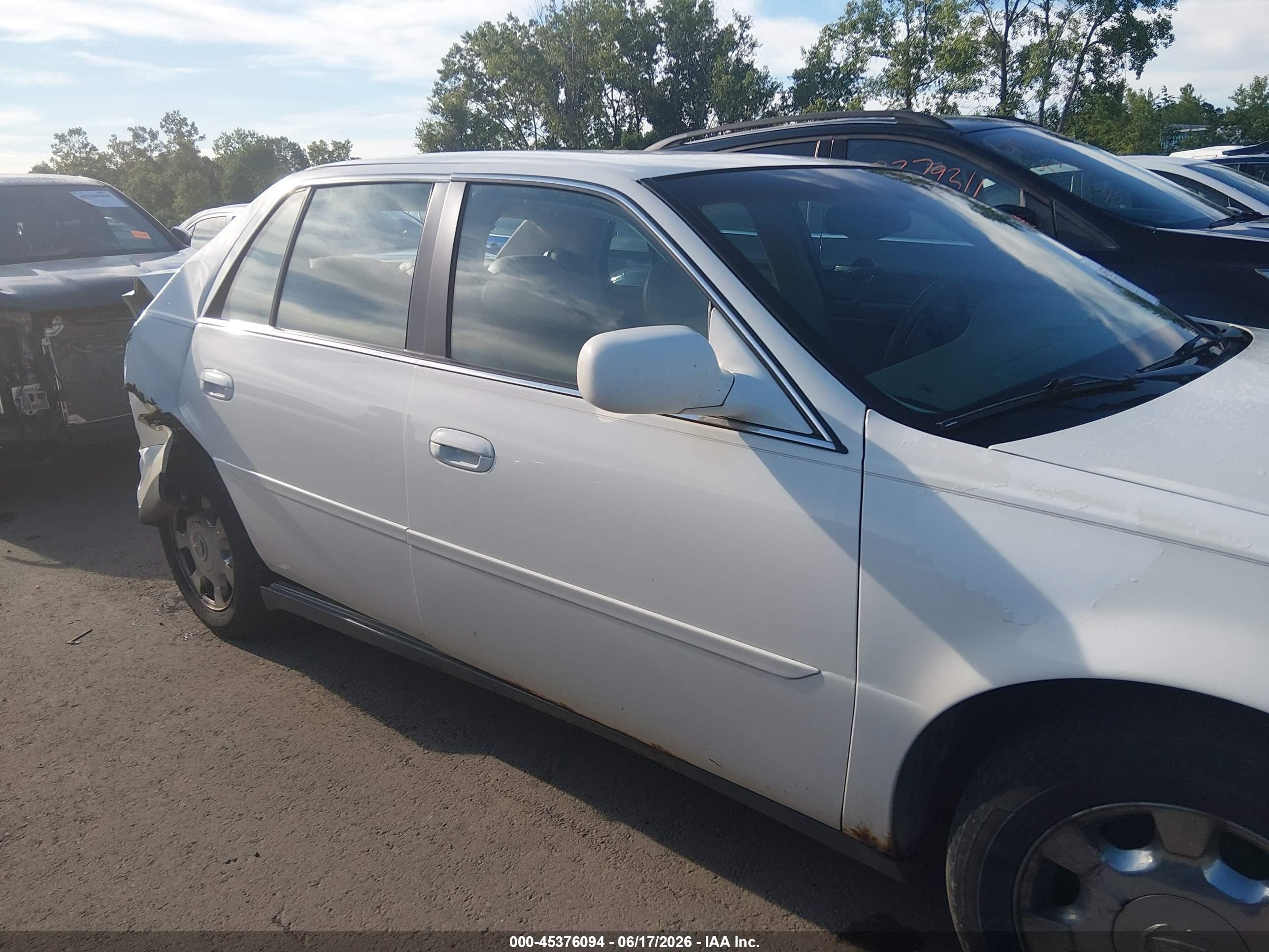 2005 Cadillac Deville   White vin: 1G6KD57Y35U100005