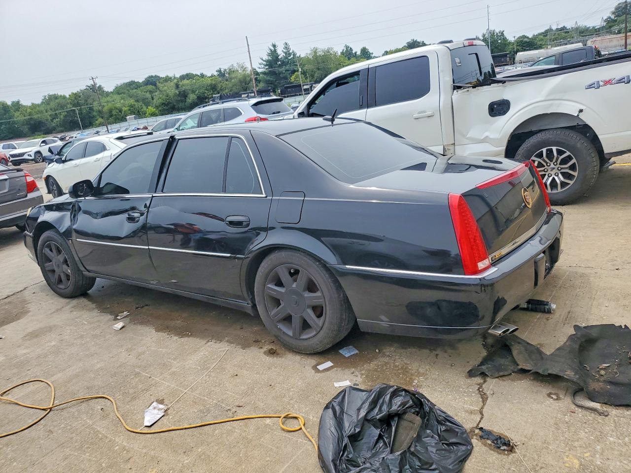 2006 Cadillac Dts Черный vin: 1G6KD57Y56U136229