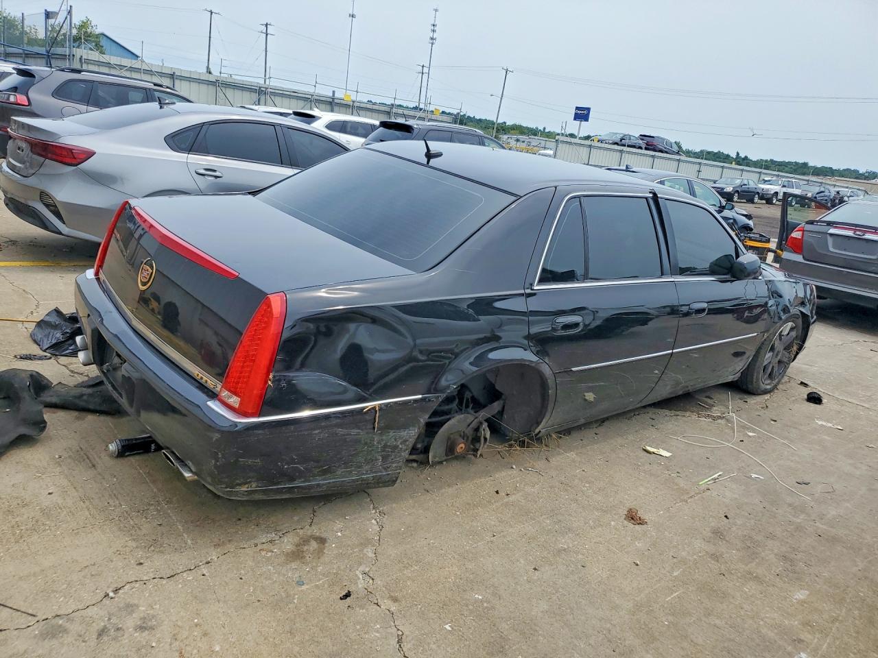 2006 Cadillac Dts Черный vin: 1G6KD57Y56U136229