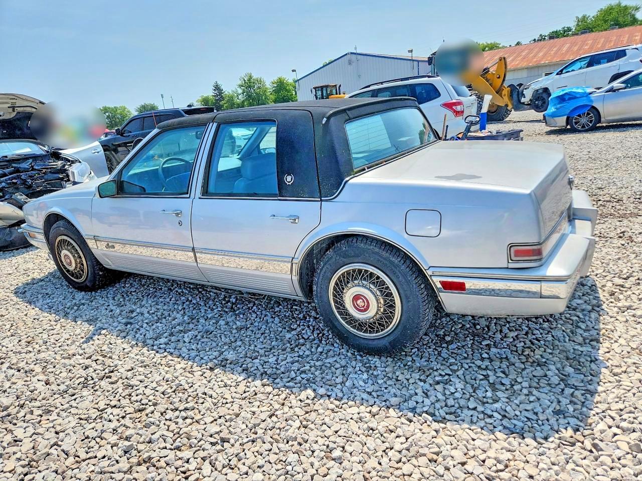 1990 Cadillac Seville Silver vin: 1G6KS5333LU809255