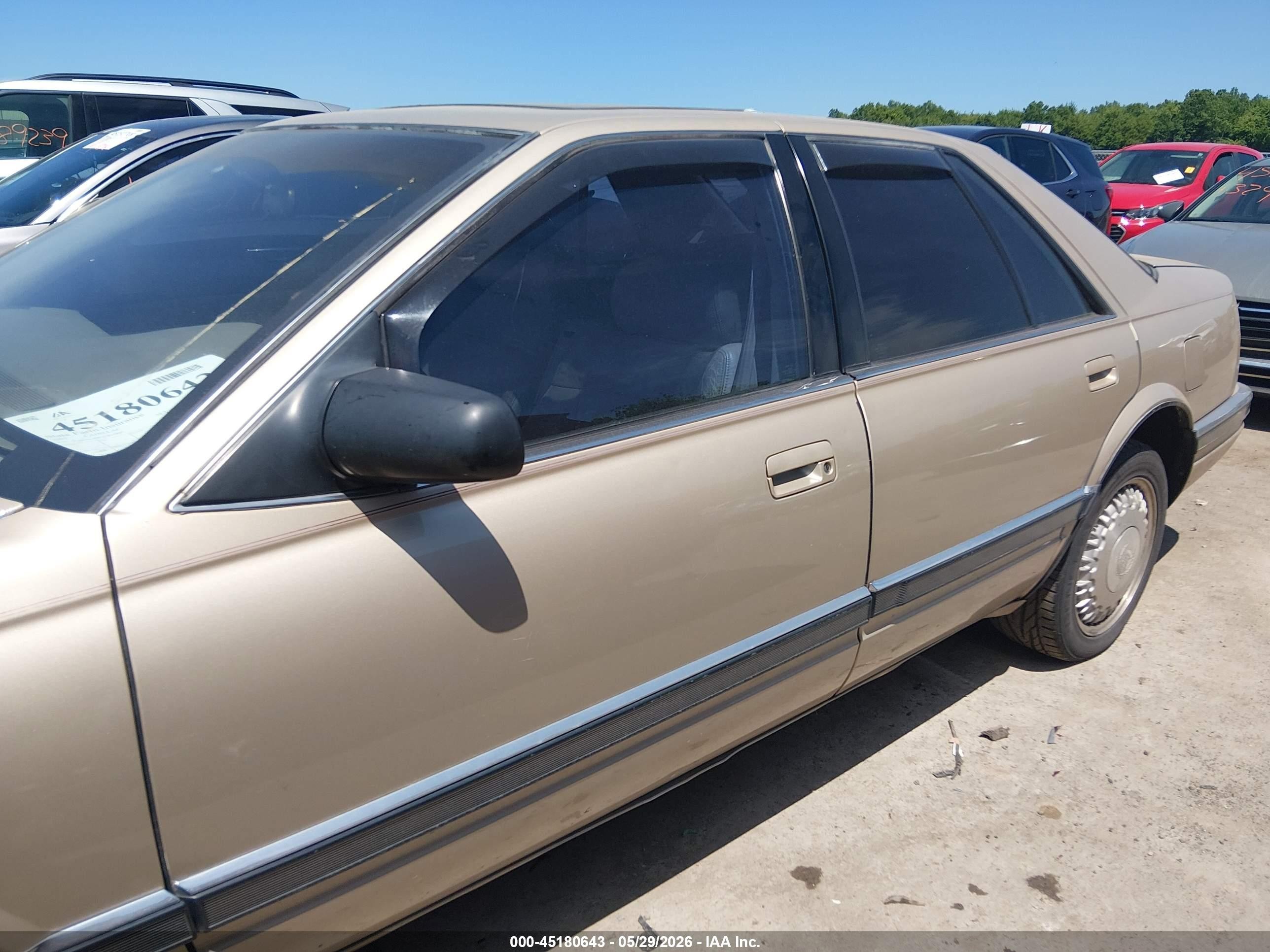 1992 Cadillac Seville   Tan vin: 1G6KS53B9NU814809