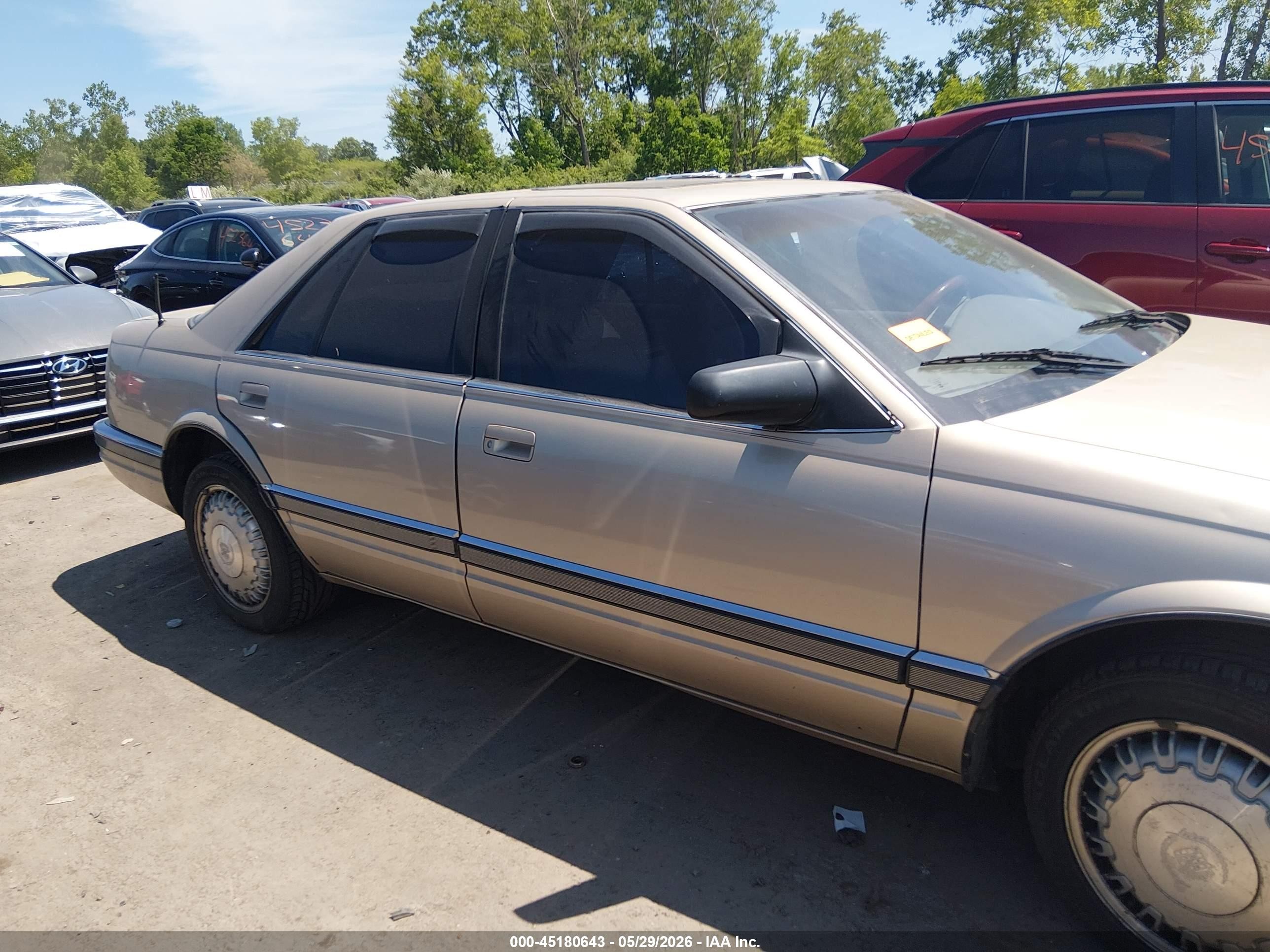 1992 Cadillac Seville   Tan vin: 1G6KS53B9NU814809