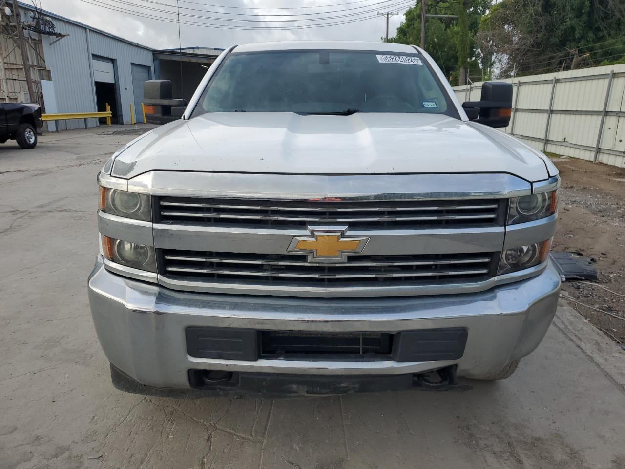 2016 Chevrolet Silverado C2500 Heavy Duty White vin: 1GC1CUEG1GF228640 Damage: Hood, Peeling, 3 To 4 Inches