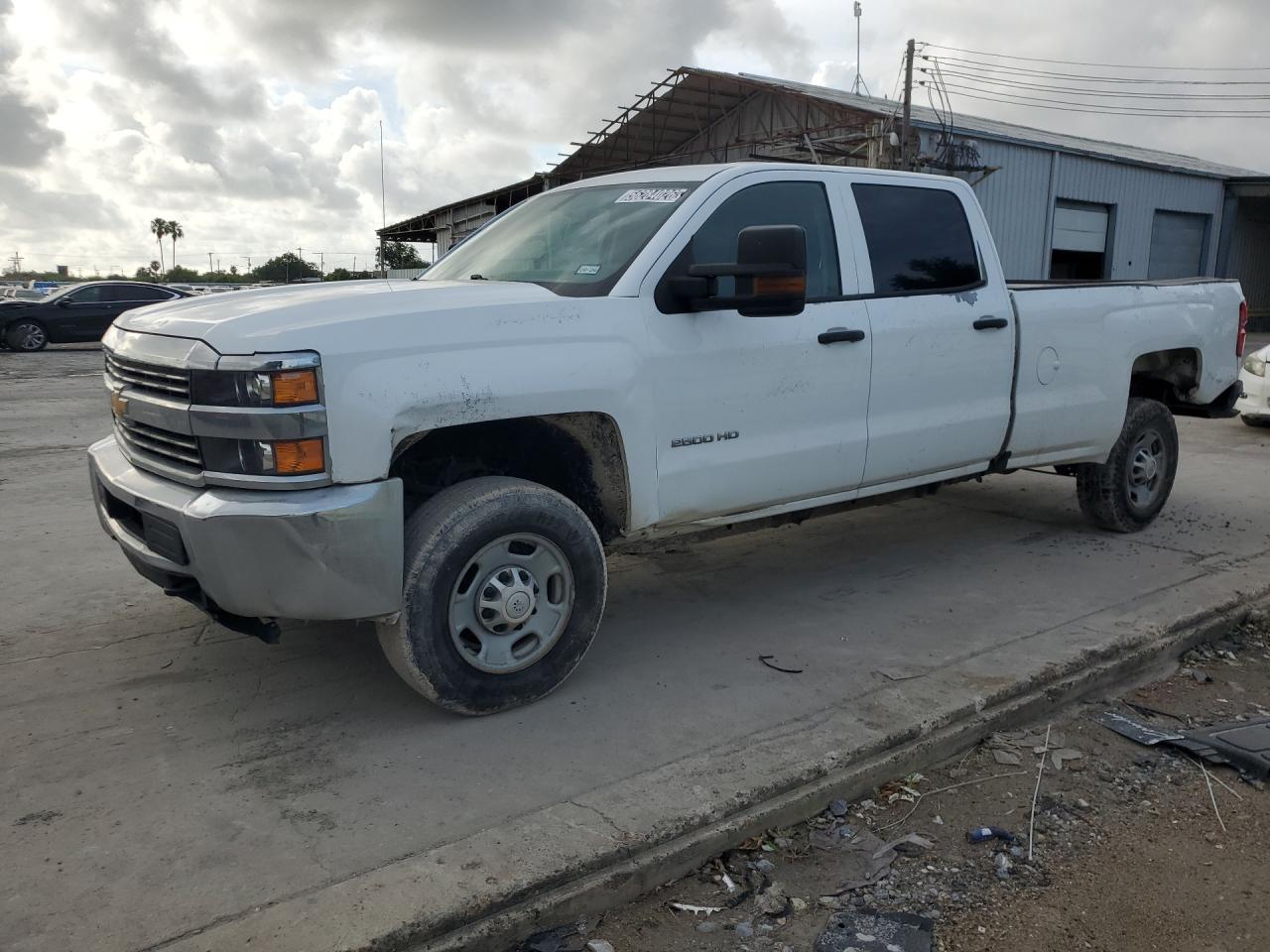 2016 Chevrolet Silverado C2500 Heavy Duty White vin: 1GC1CUEG1GF228640 Damage: Left Front Fender, Dent(S) W/ Paint Dmg, 3 To 4 Inches
