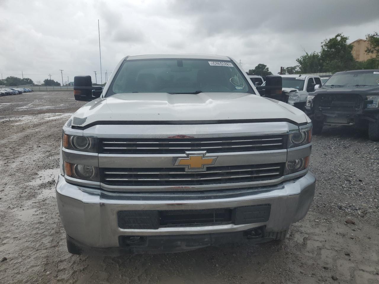 2016 Chevrolet Silverado C2500 Heavy Duty White vin: 1GC1CUEG1GF228640 Damage: Hood, Peeling, 5 To 6 Inches