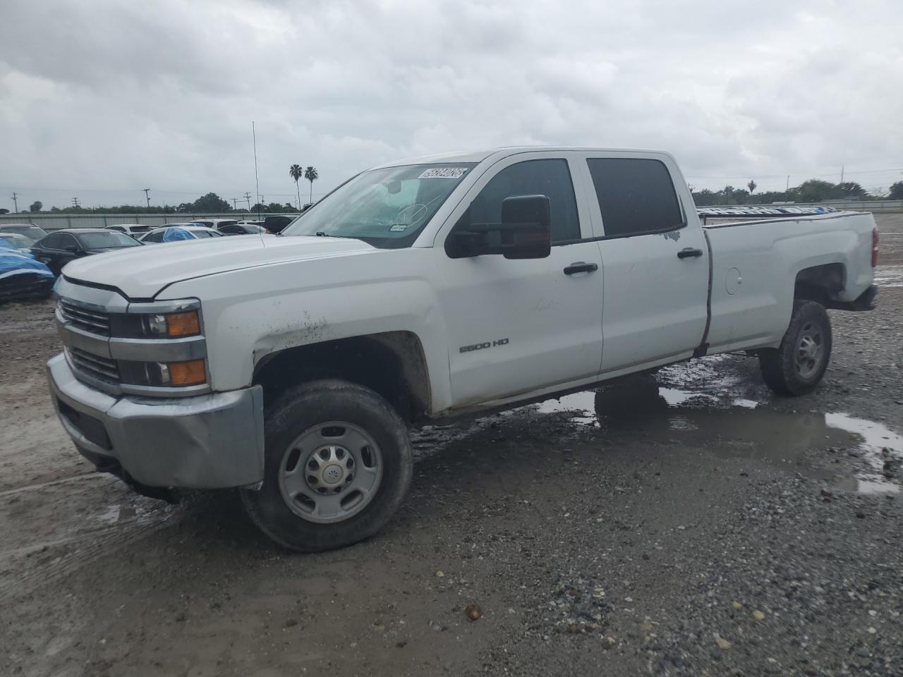 2016 Chevrolet Silverado C2500 Heavy Duty White vin: 1GC1CUEG1GF228640 Damage: Left Front Fender, Peeling, > 12 Inches