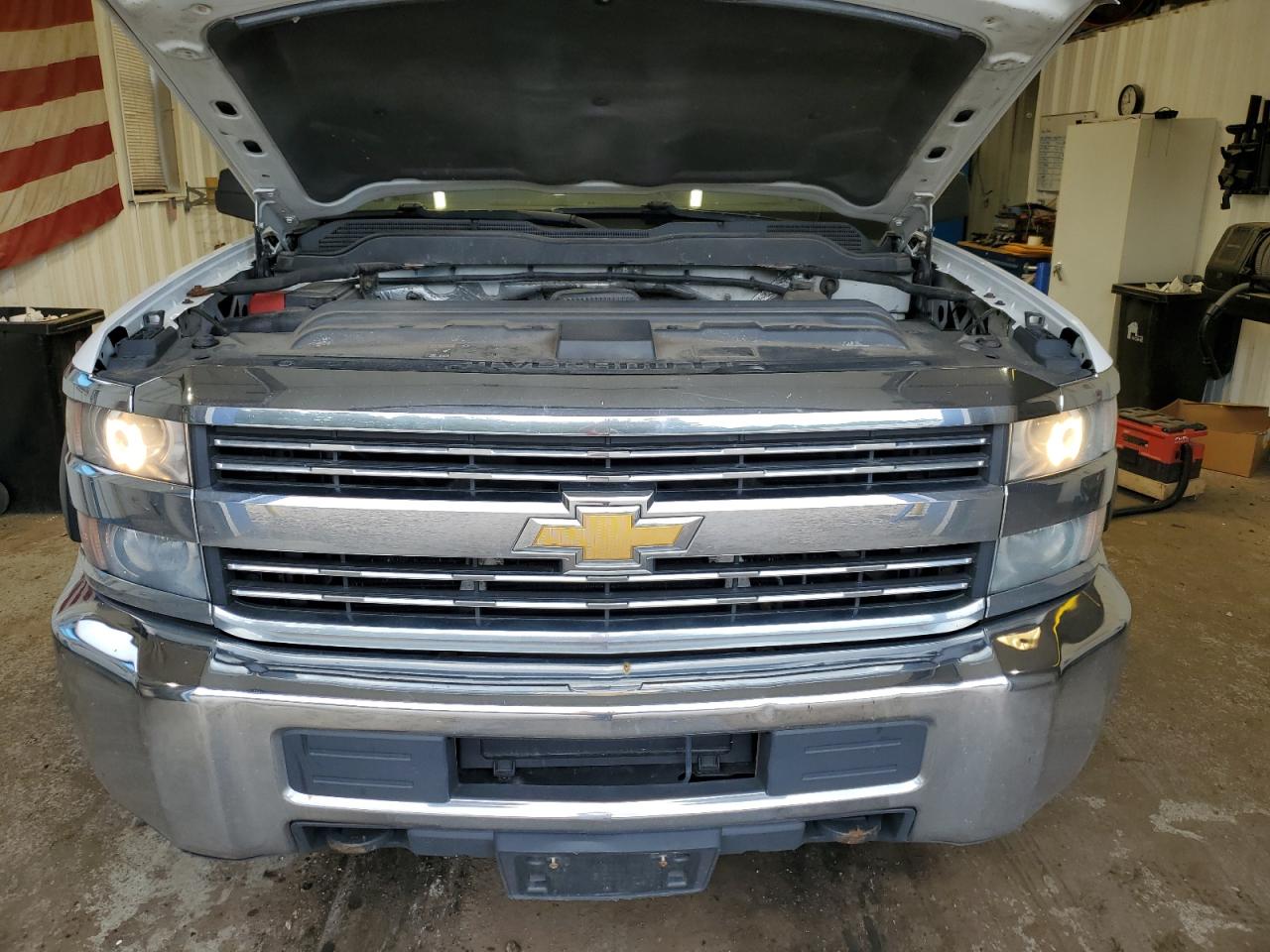 2015 Chevrolet Silverado C2500 Heavy Duty White vin: 1GC1CUEG7FF158527 Damage: Front Metal Bumper Chrome, Dent(S) W/No Paint Dmg, 2 To 3 Inches