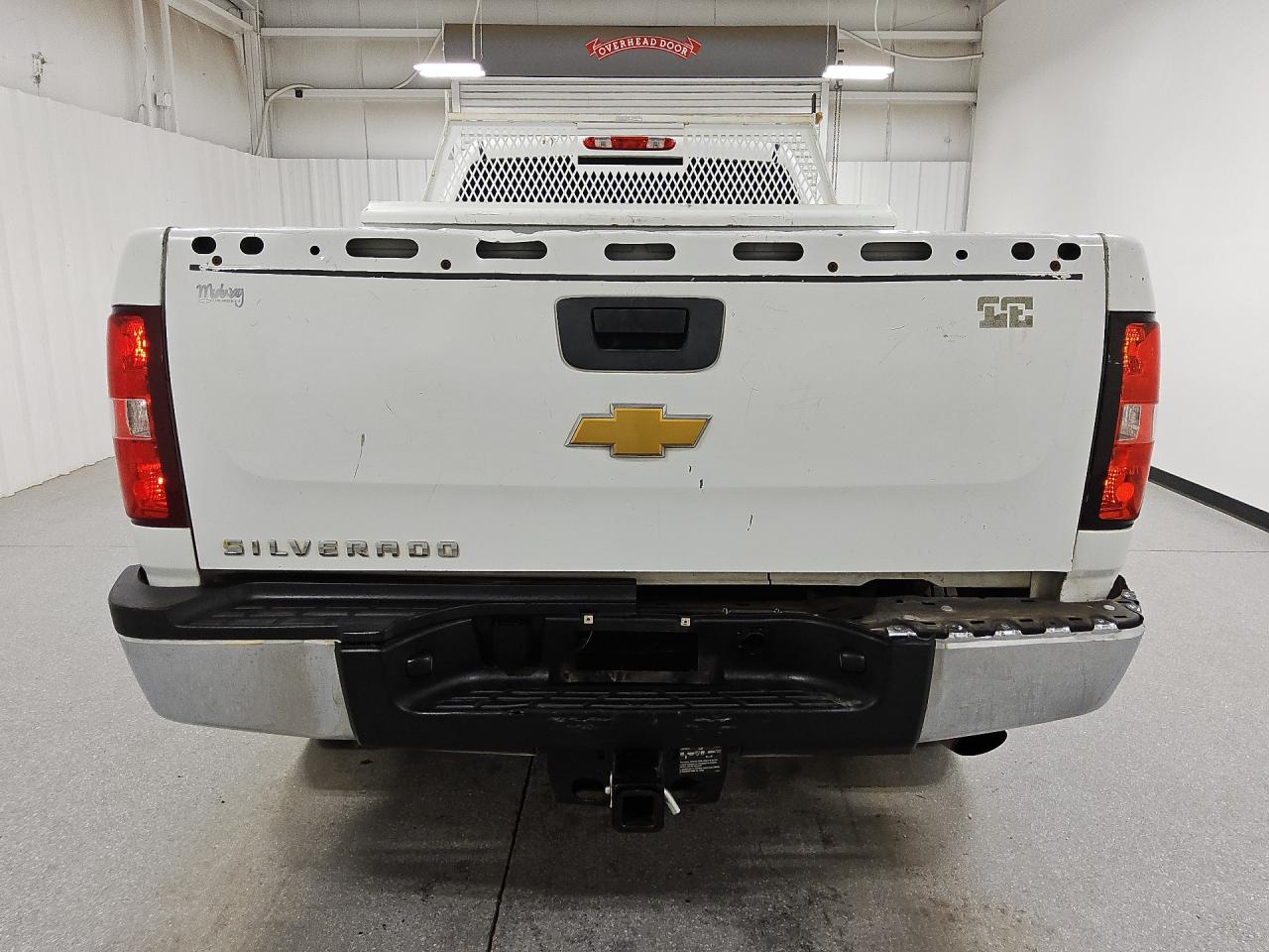 2014 Chevrolet Silverado C2500 Heavy Duty White vin: 1GC1CVCG0EF120452 Damage: Rear Metal Bumper Chrome, Multiple Dents/No Paint Damage, 2