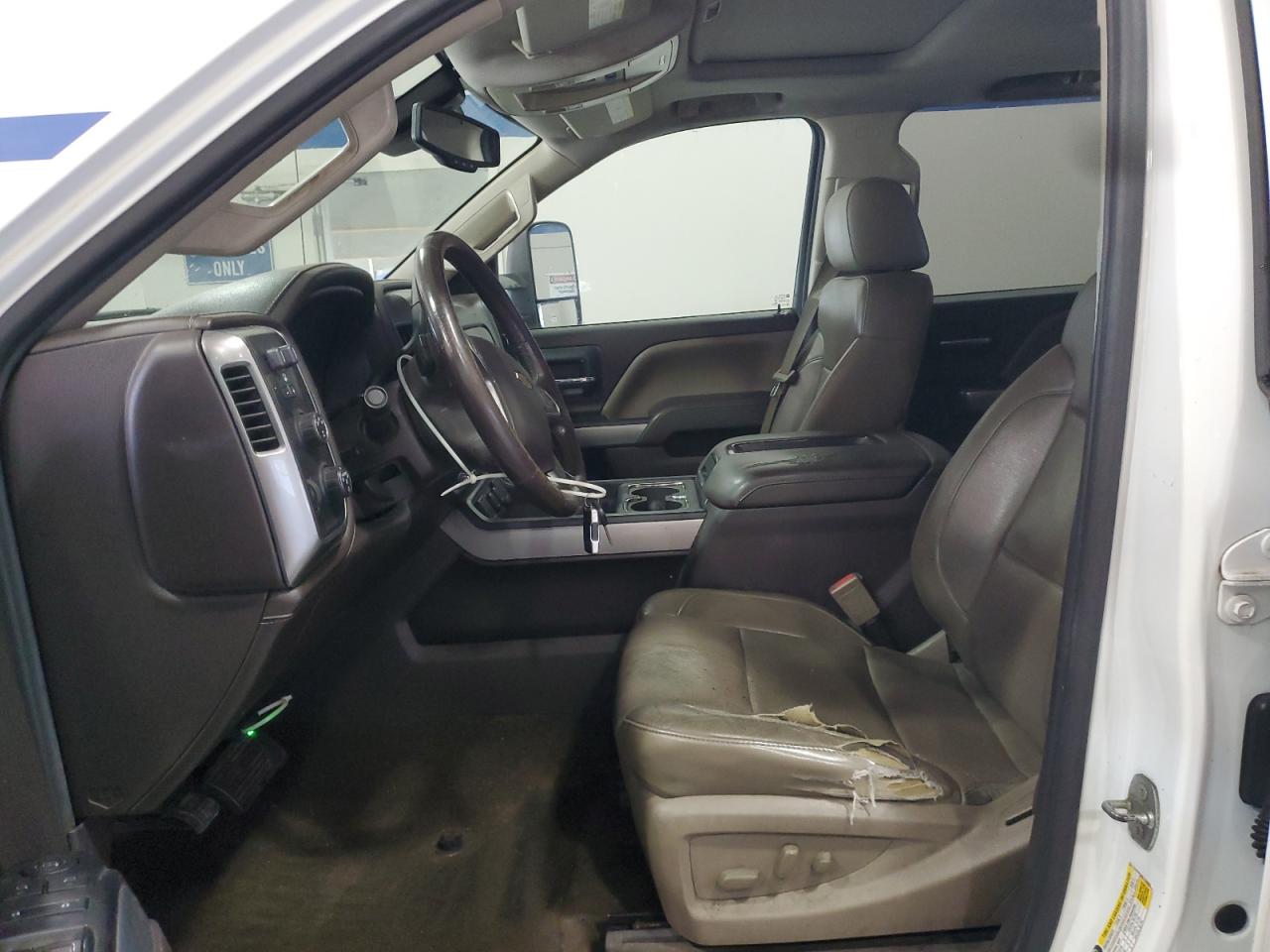 2015 Chevrolet Silverado K2500 Heavy Duty Ltz White vin: 1GC1KWE86FF195835 Damage: Left Front Seat, Worn, Replacement Required